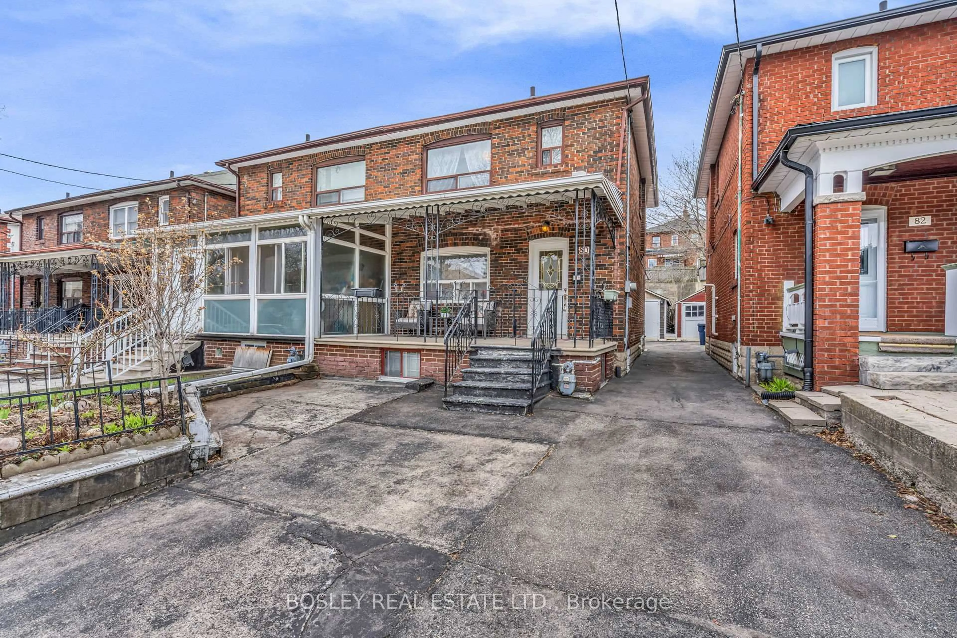 Home with brick exterior material, street for 80 Roseneath Gdns, Toronto Ontario M6C 3X6