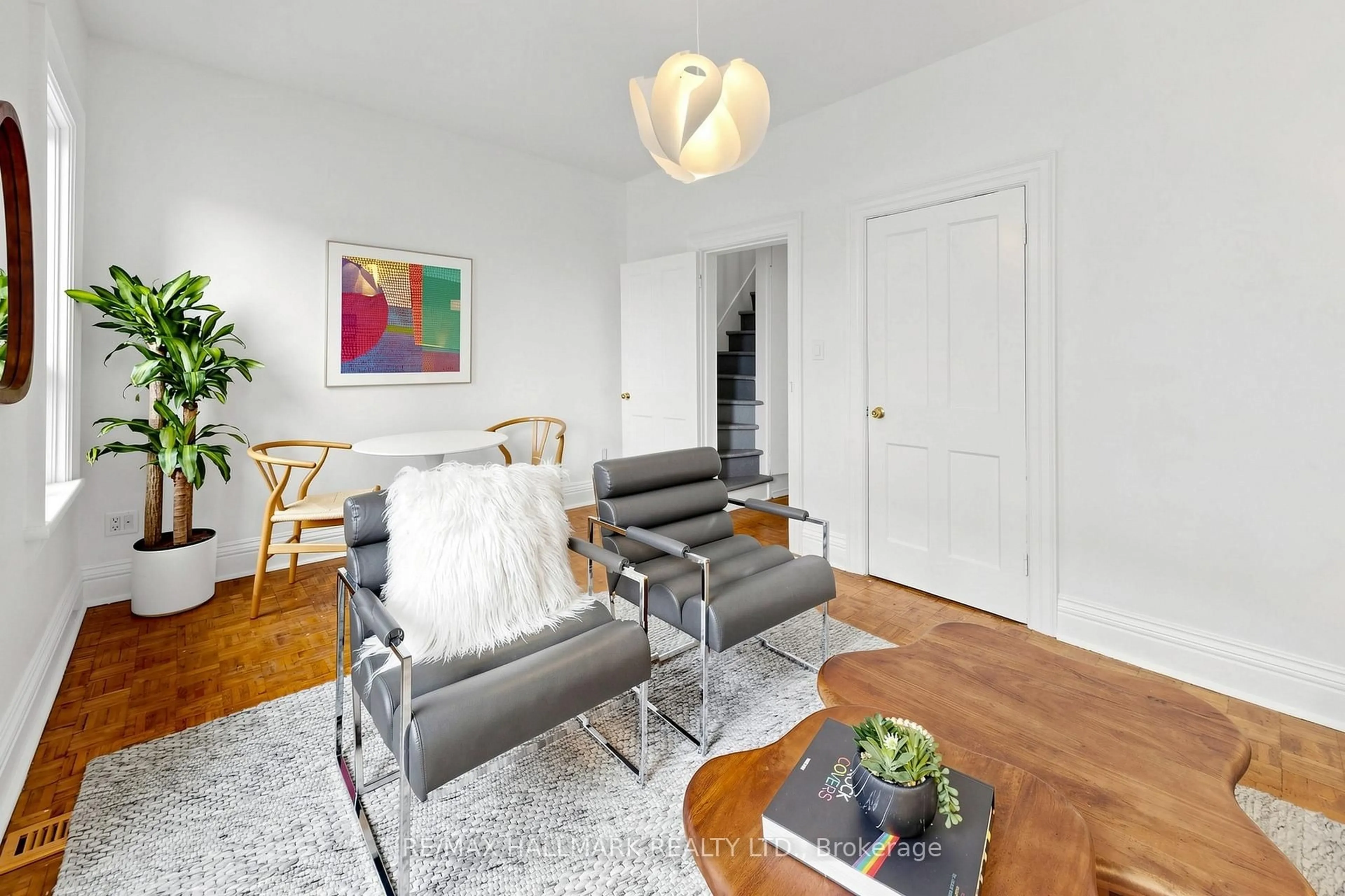 Living room with furniture, wood/laminate floor for 80 Manning Ave, Toronto Ontario M6J 2K5