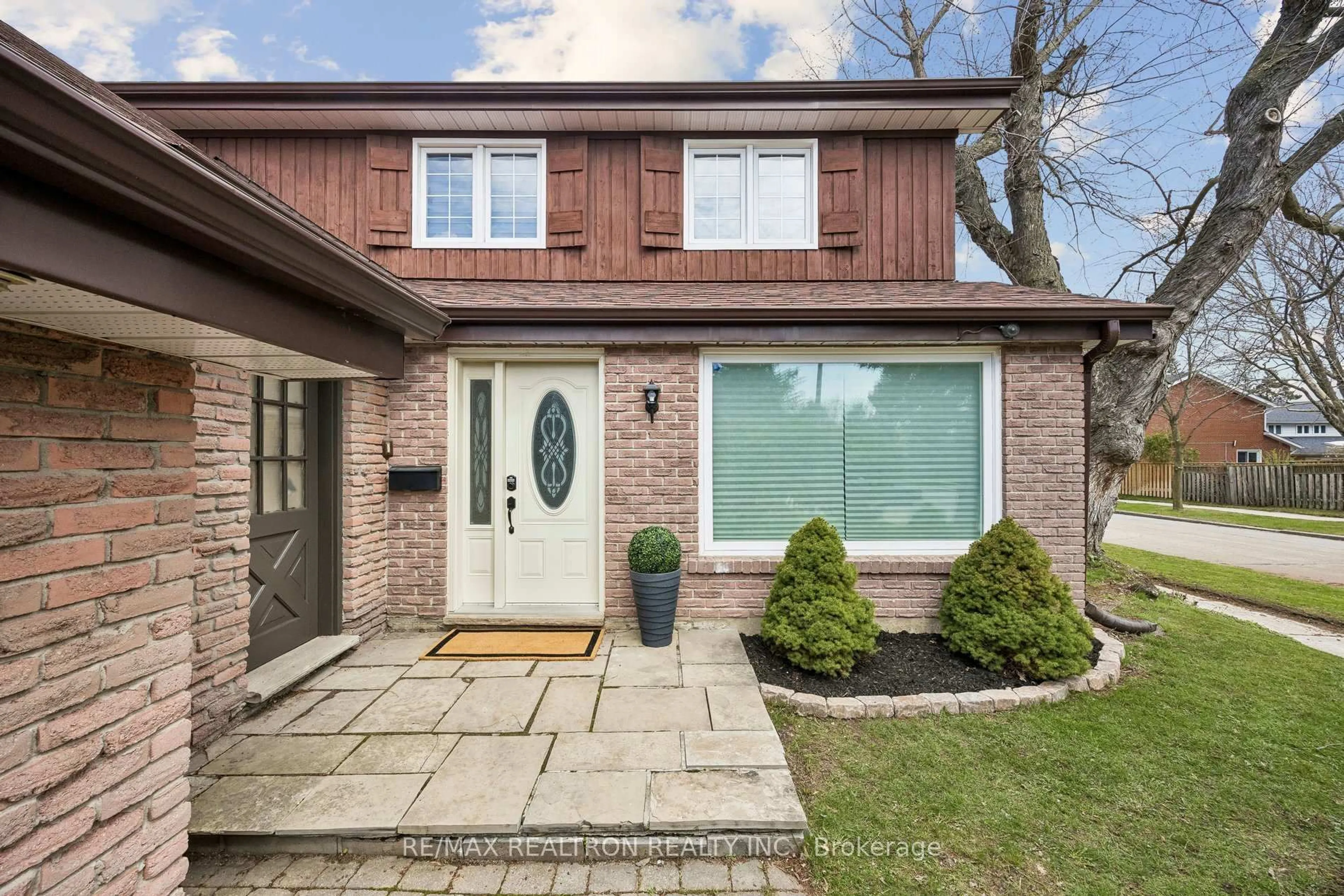 Home with brick exterior material, street for 22 Denlow Blvd, Toronto Ontario M3B 1P4