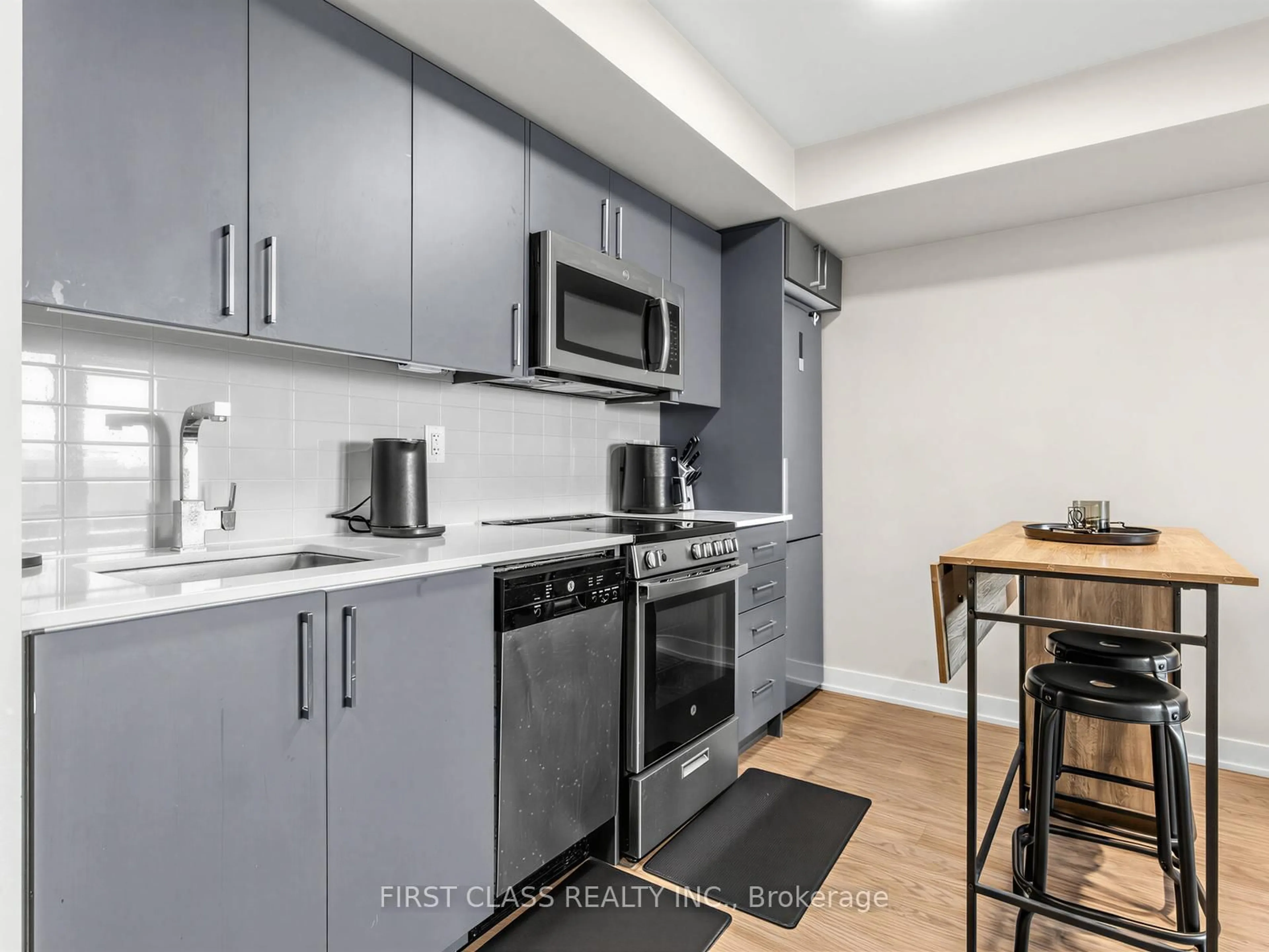Standard kitchen, unknown for 38 Monte Kwinter Crt #616, Toronto Ontario M3H 0E2