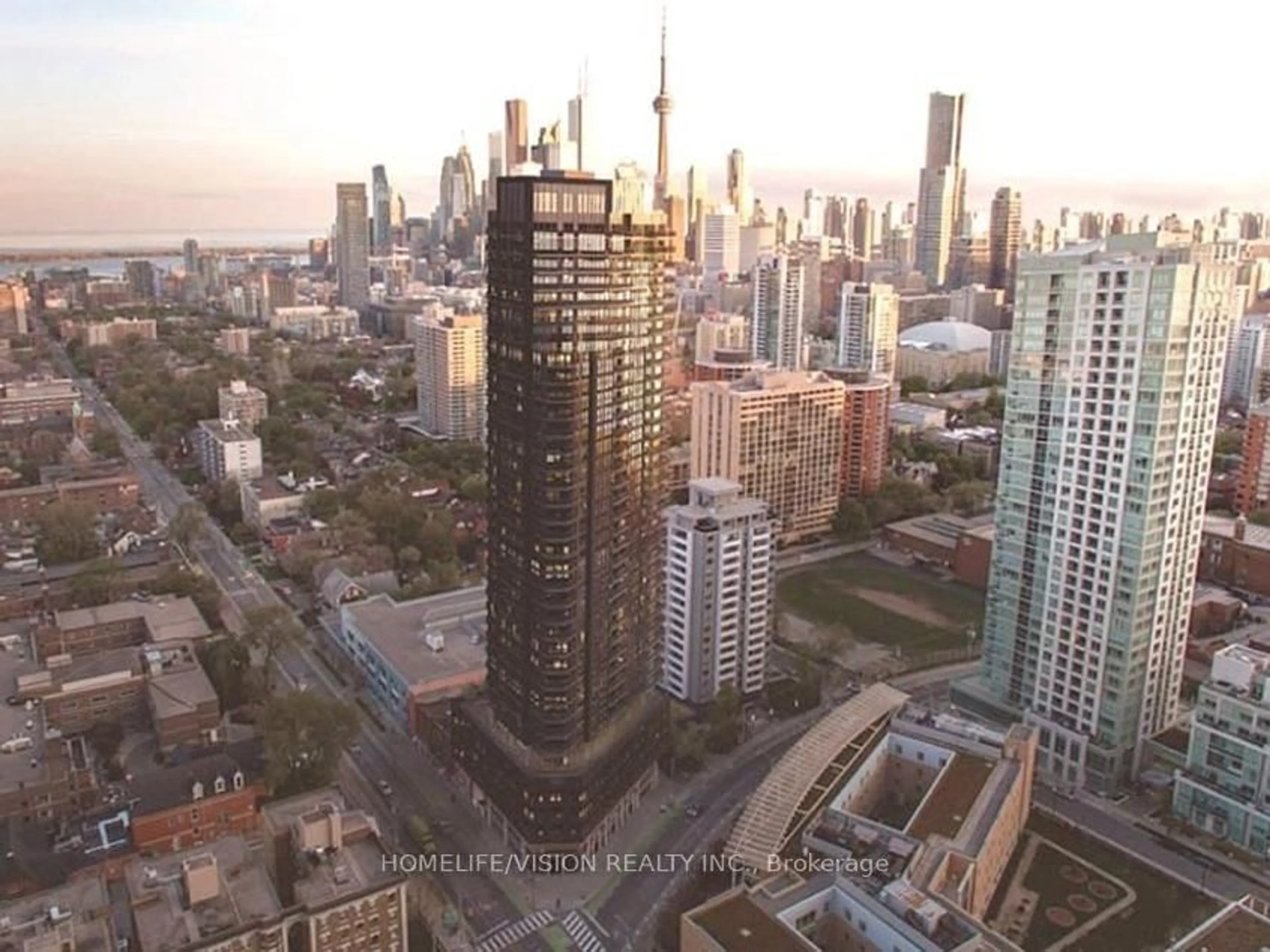 A pic from outside/outdoor area/front of a property/back of a property/a pic from drone, city buildings view from balcony for 159 Wellesley St #2806, Toronto Ontario M4Y 0H5