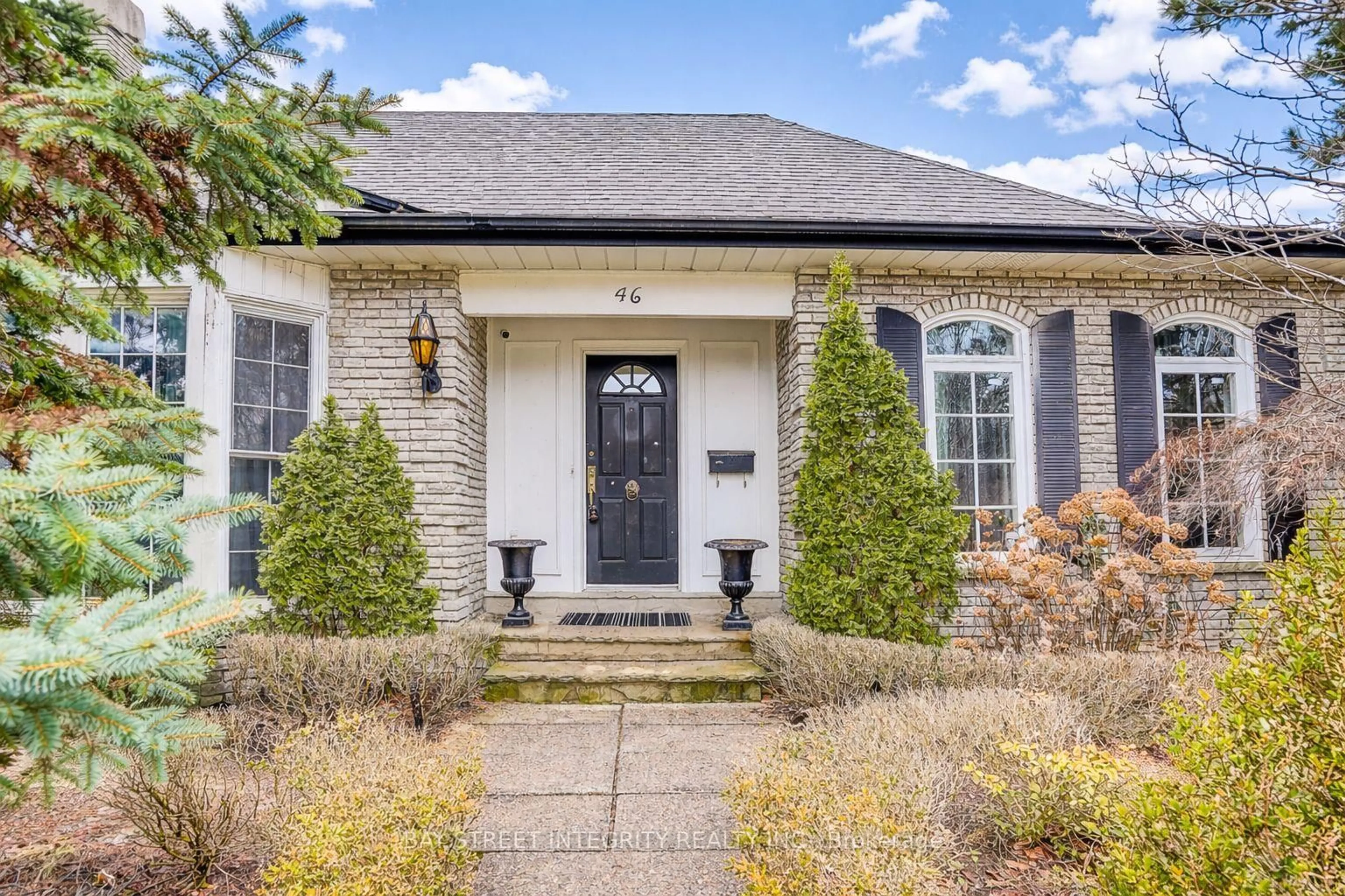 Home with brick exterior material, street for 46 Caravan Dr, Toronto Ontario M3B 1N3