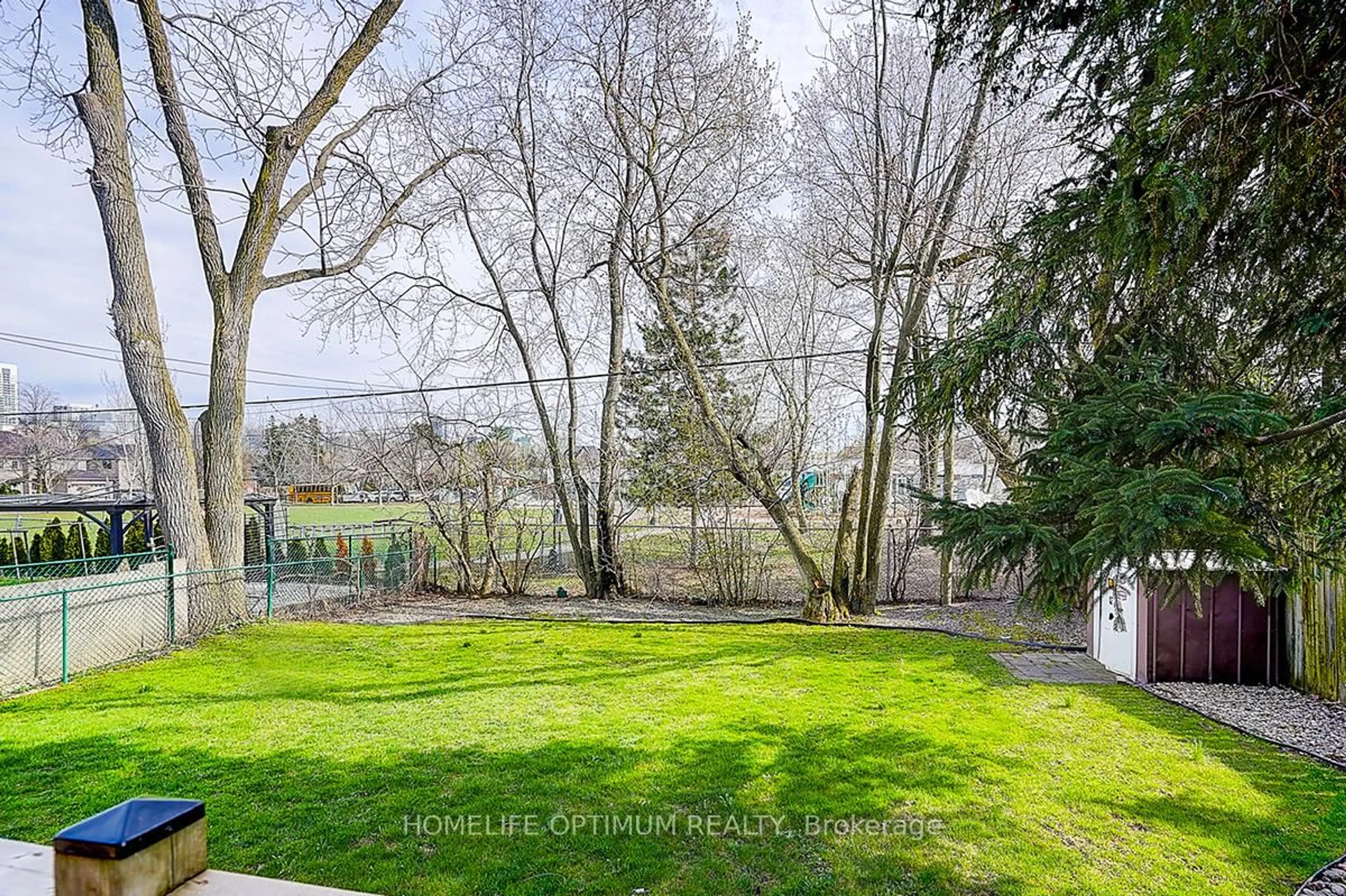 A pic from outside/outdoor area/front of a property/back of a property/a pic from drone, forest/trees view for 225 Horsham Ave, Toronto Ontario M2N 2A7