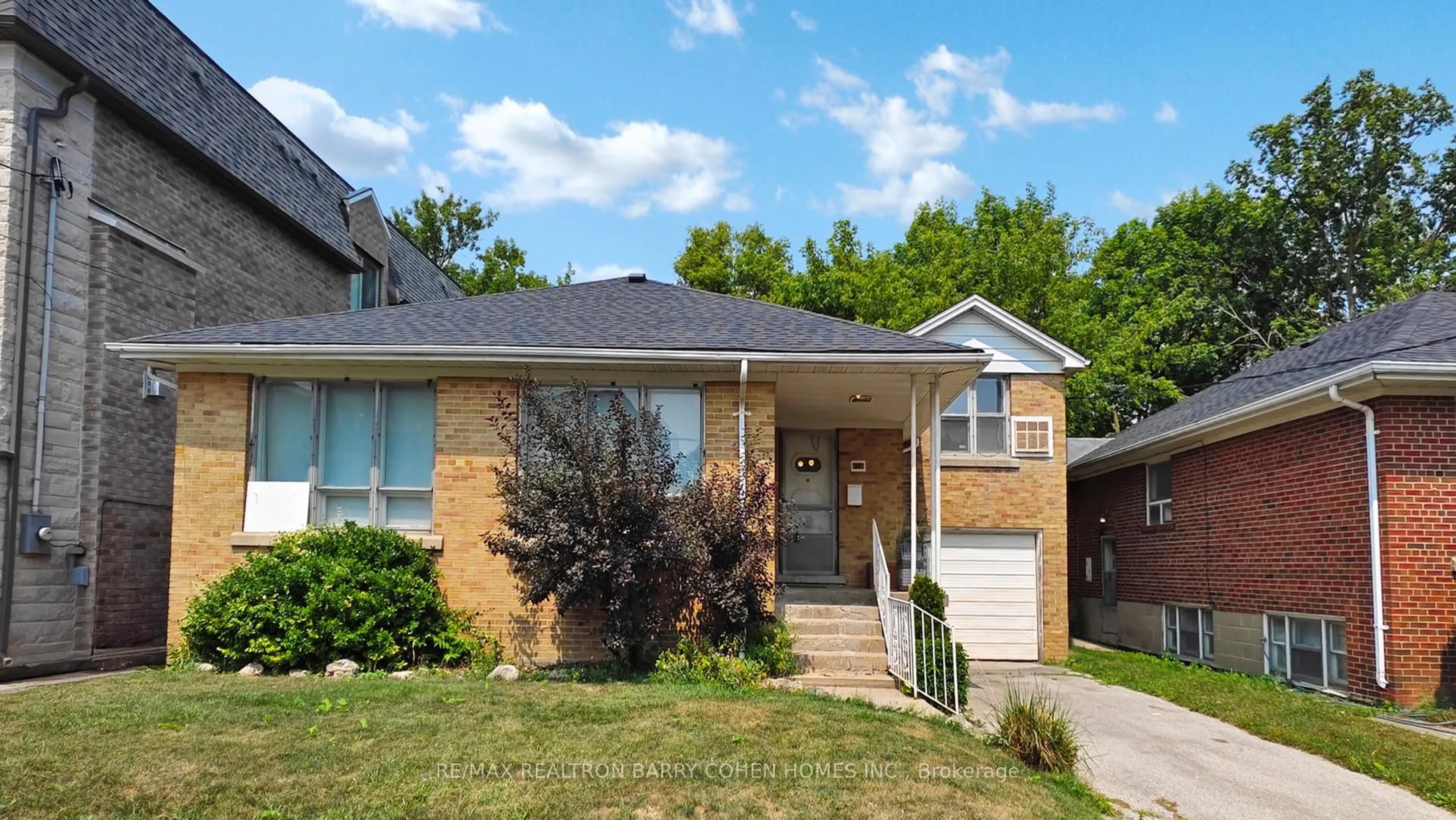 Home with brick exterior material, street for 174 Caribou Rd, Toronto Ontario M5N 2B6