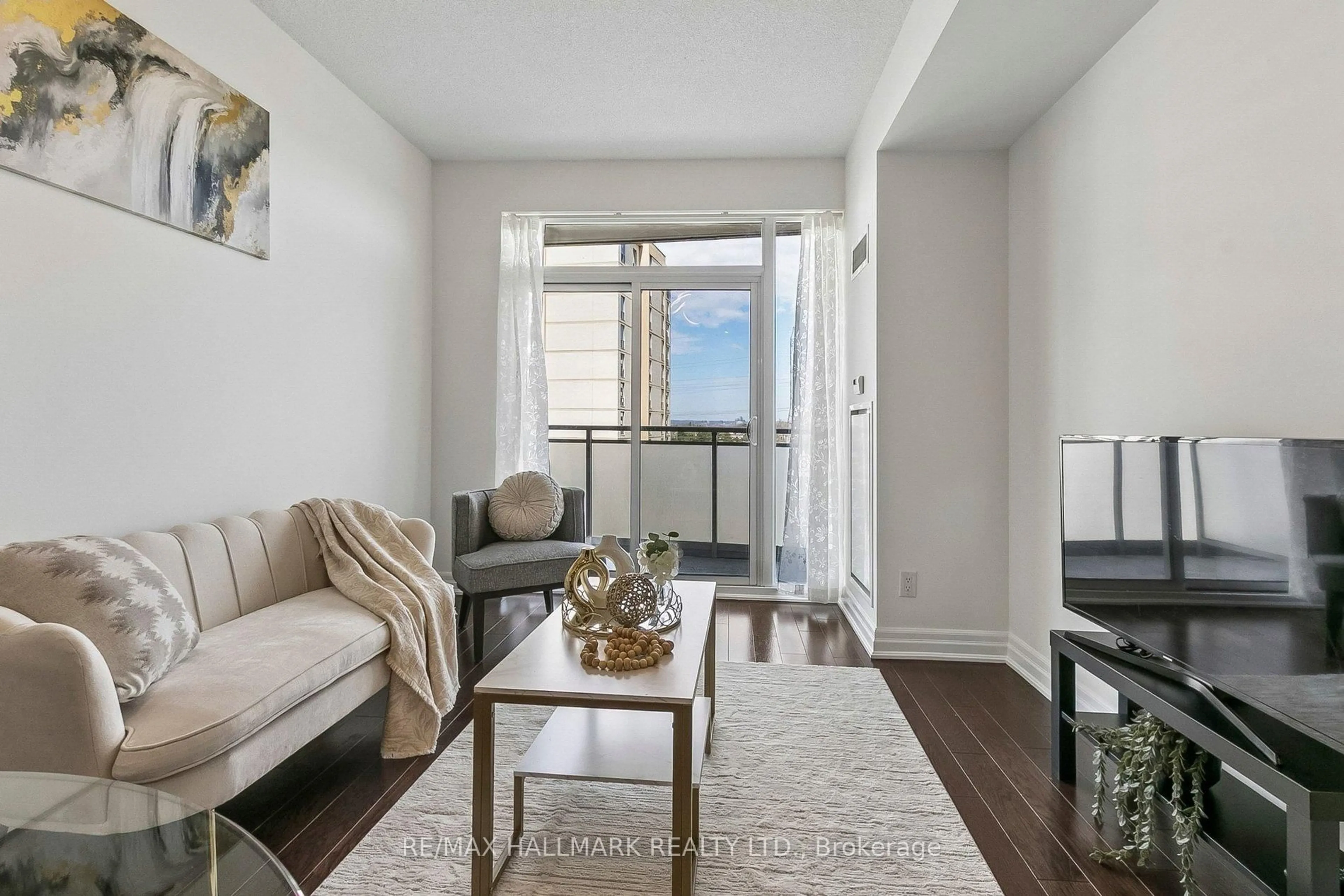 Living room with furniture, unknown for 17 Ruddington Dr #705, Toronto Ontario M2K 0A8