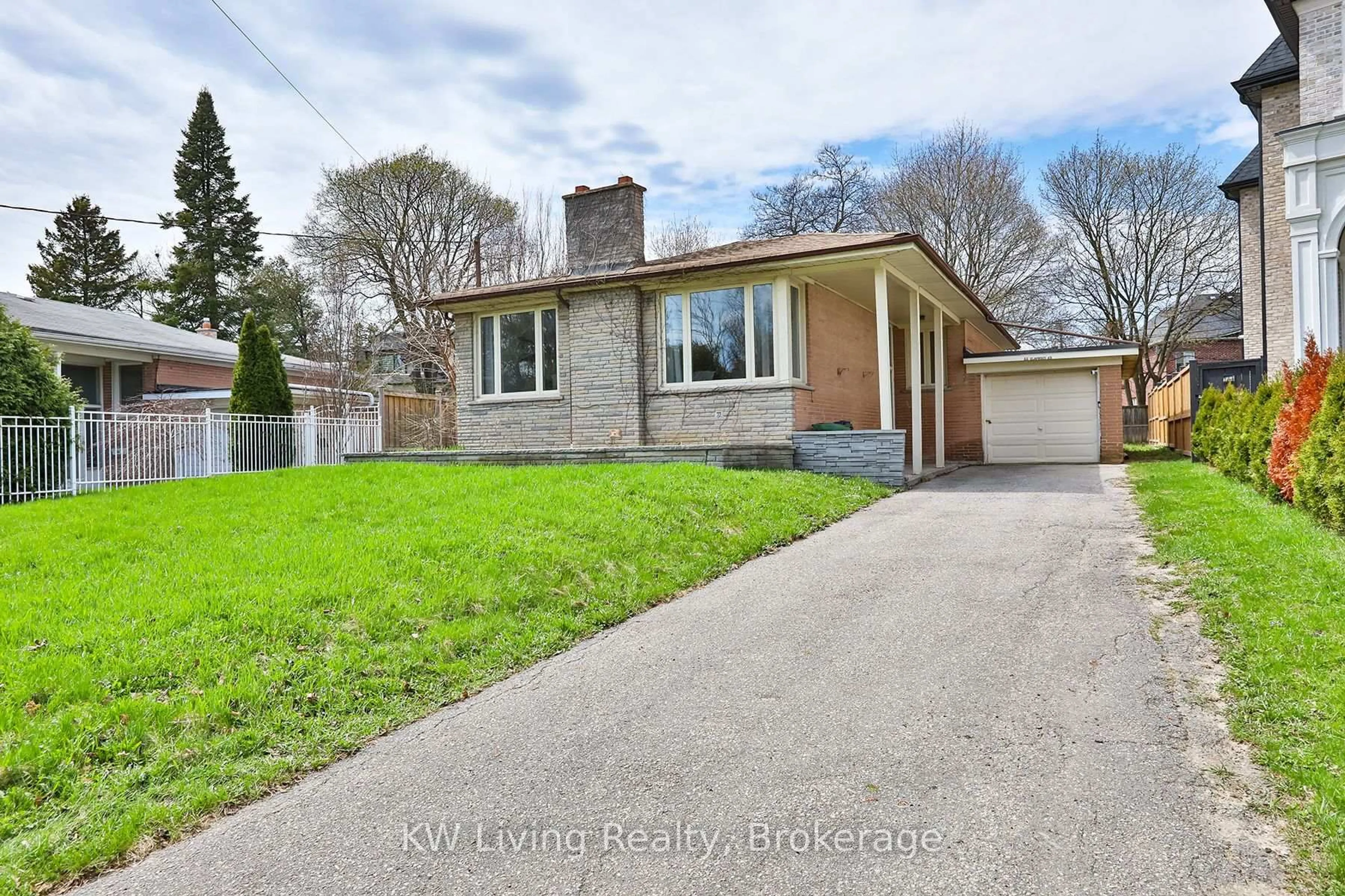 Home with brick exterior material, street for 66 Claywood Rd, Toronto Ontario M2N 2R2