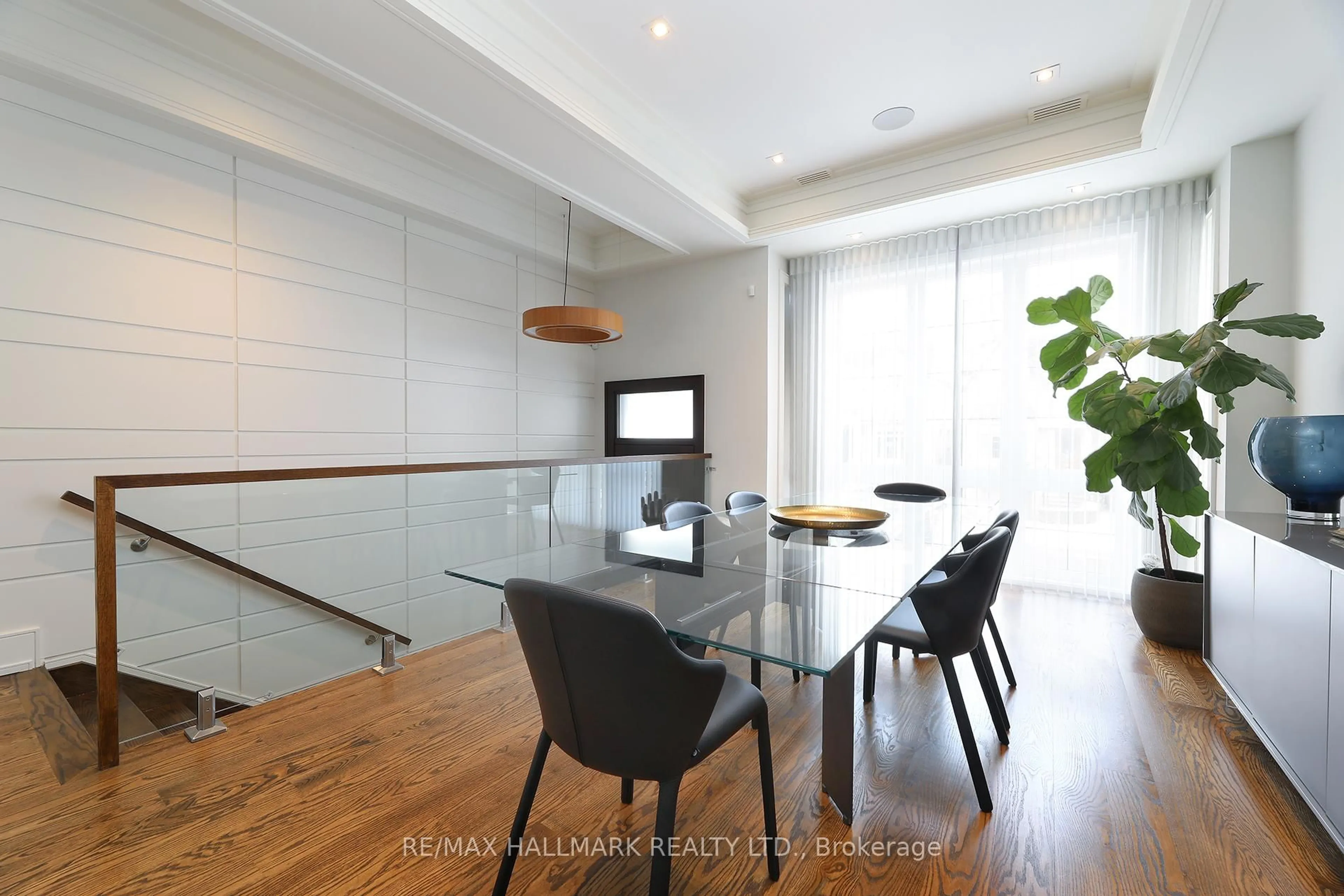 Dining room, wood/laminate floor for 159 Roe Ave, Toronto Ontario M5M 2J1