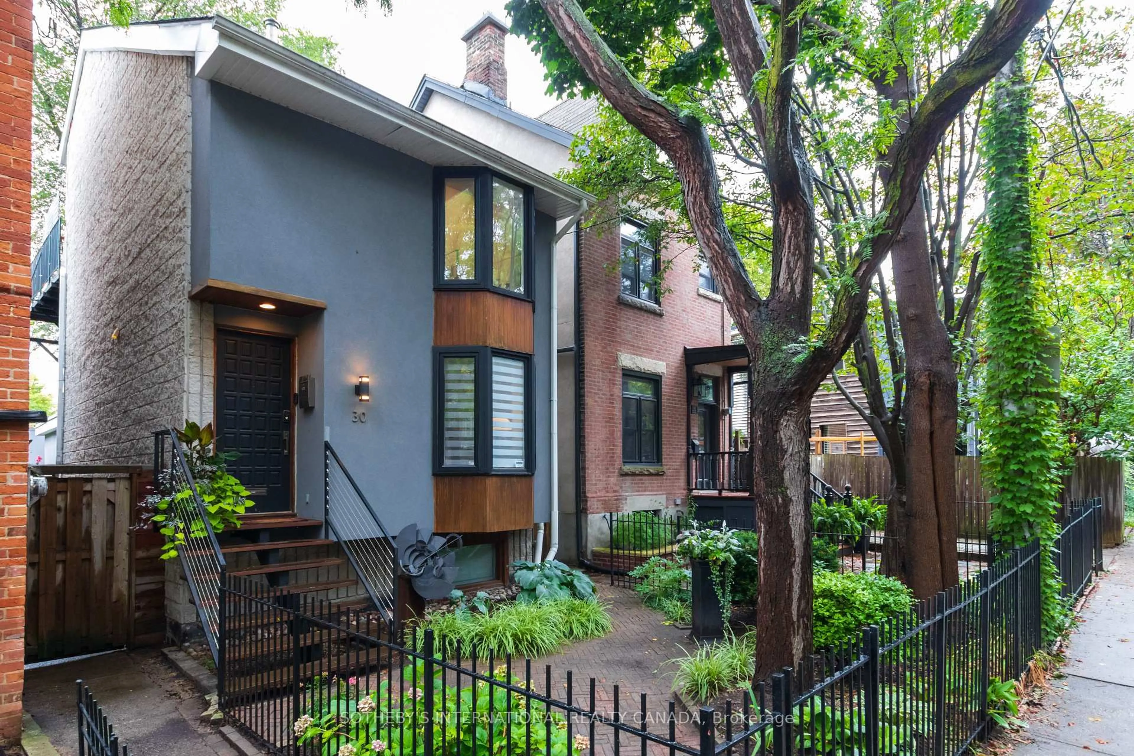 Home with brick exterior material, street for 30 Sword St, Toronto Ontario M5A 3N2