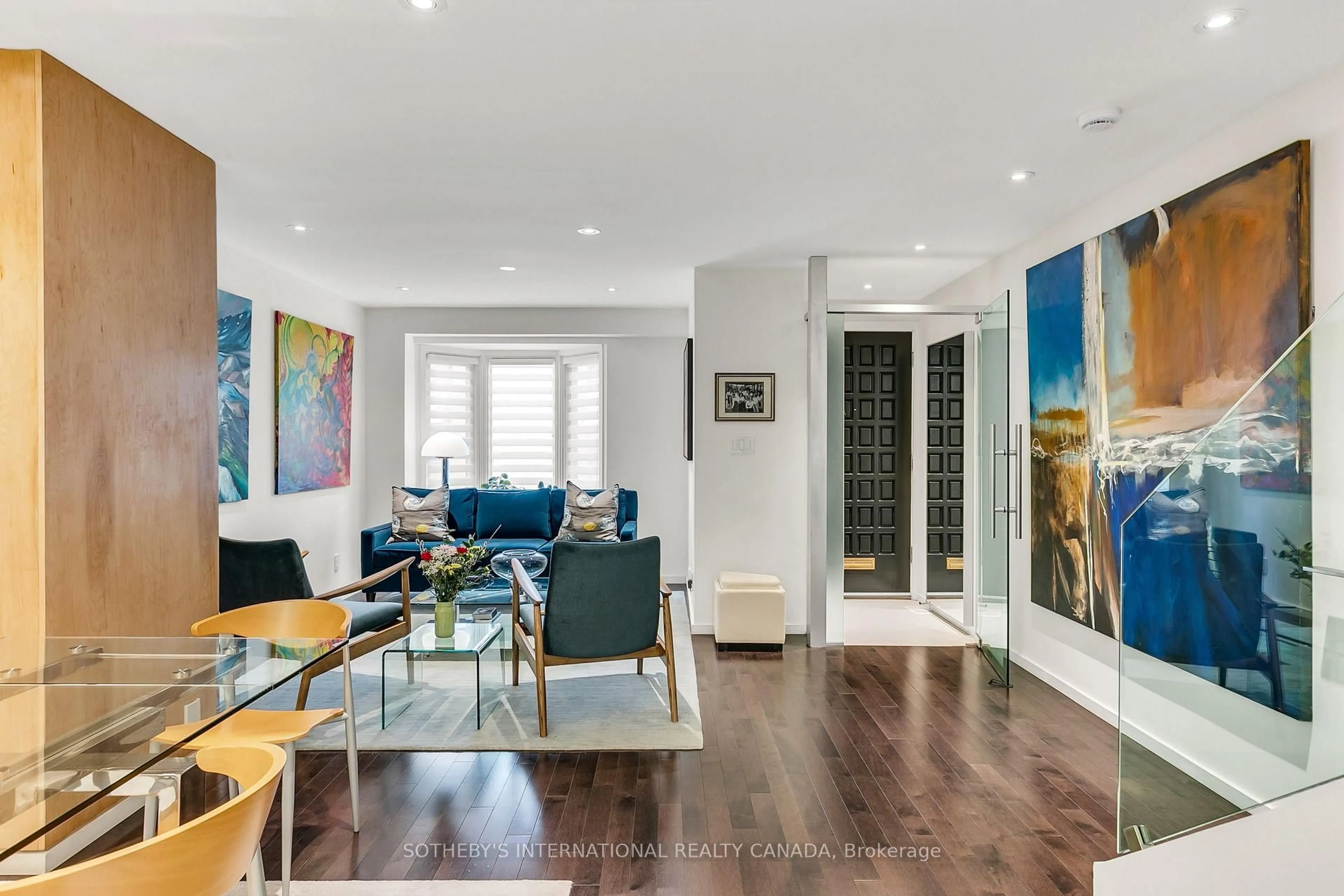 Living room with furniture, wood/laminate floor for 30 Sword St, Toronto Ontario M5A 3N2