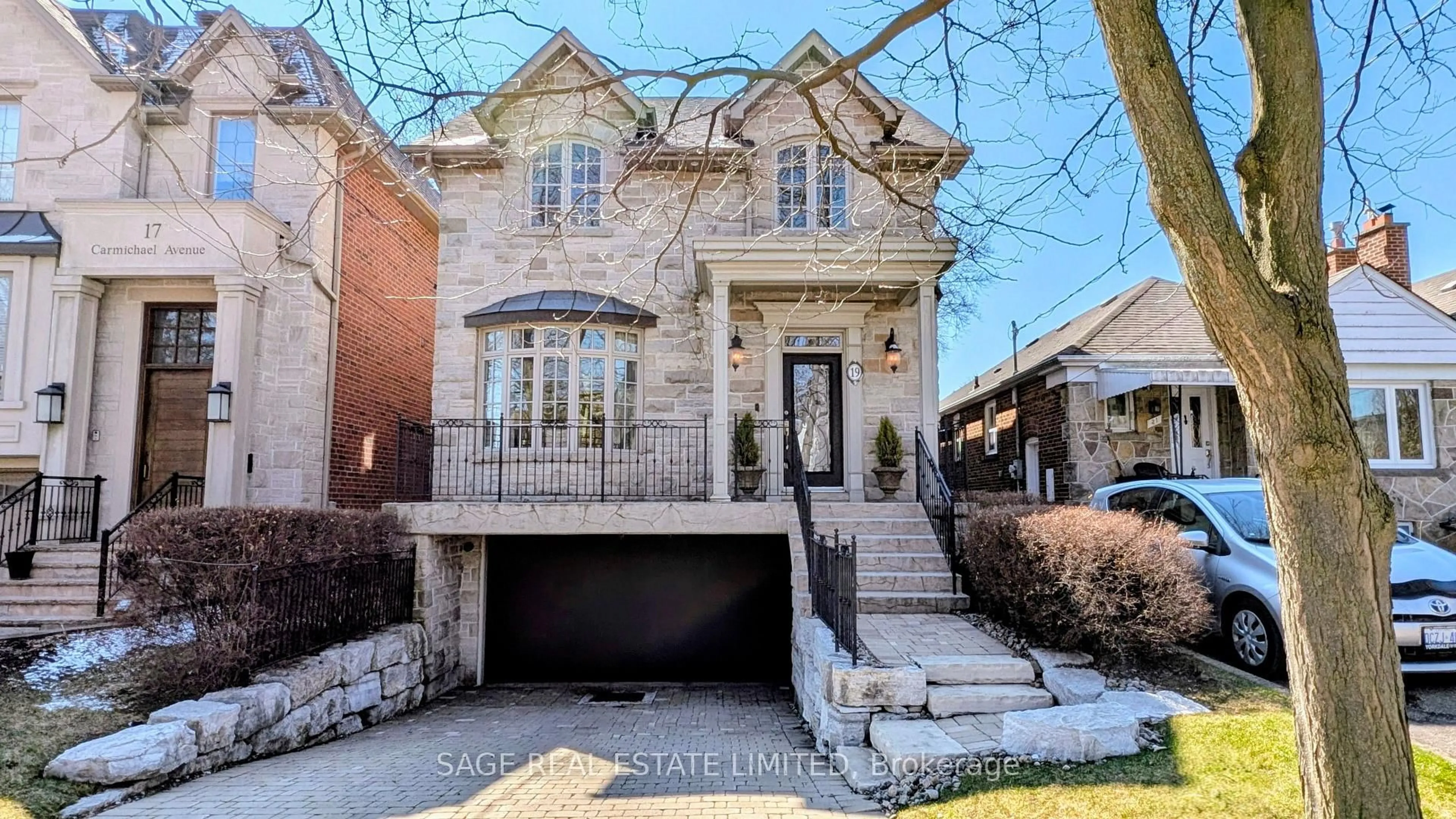 Home with brick exterior material, street for 19 Carmichael Ave, Toronto Ontario M5M 2W5