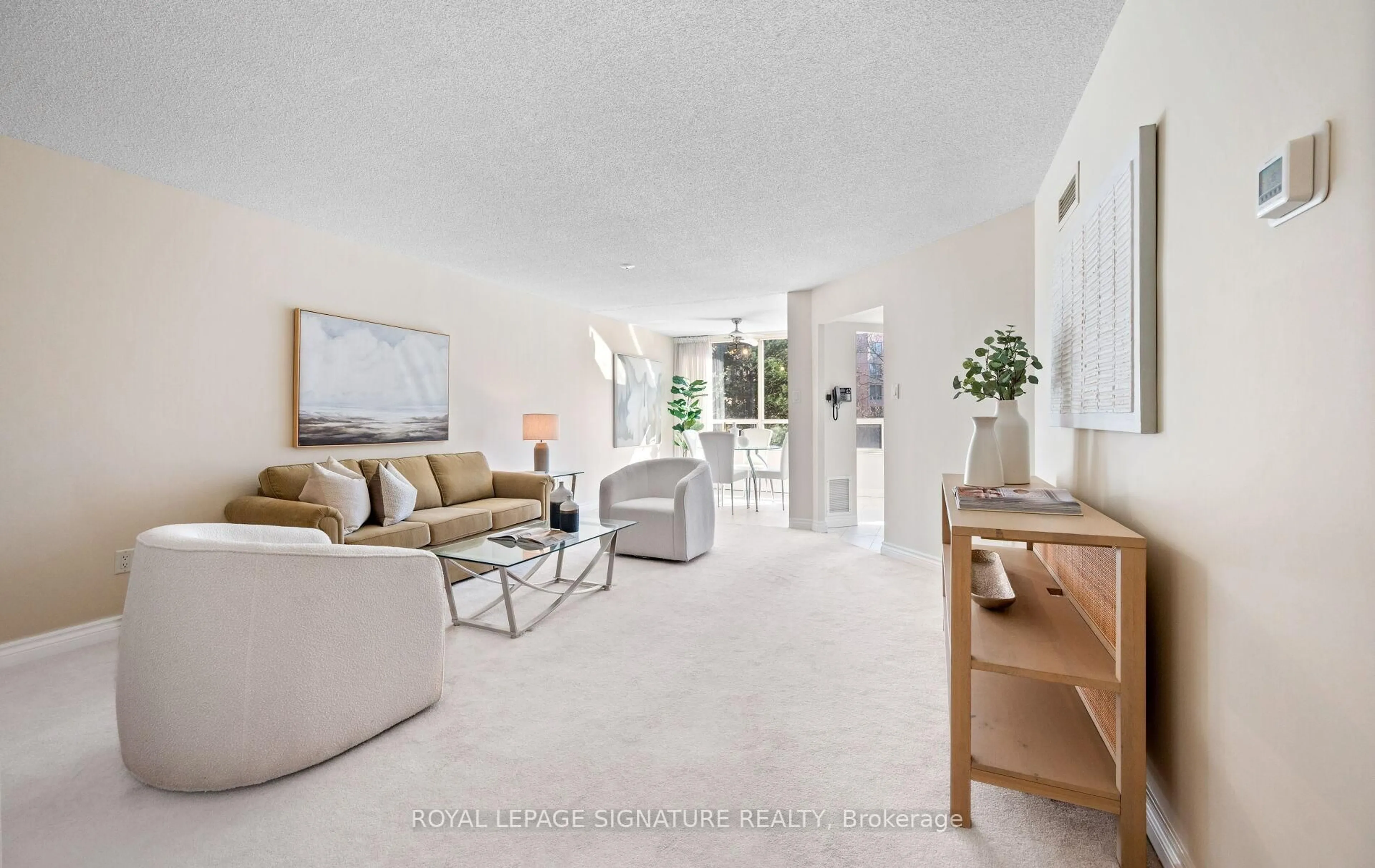 Living room with furniture, ceramic/tile floor for 1210 Don Mills Rd #324, Toronto Ontario M3B 3N9