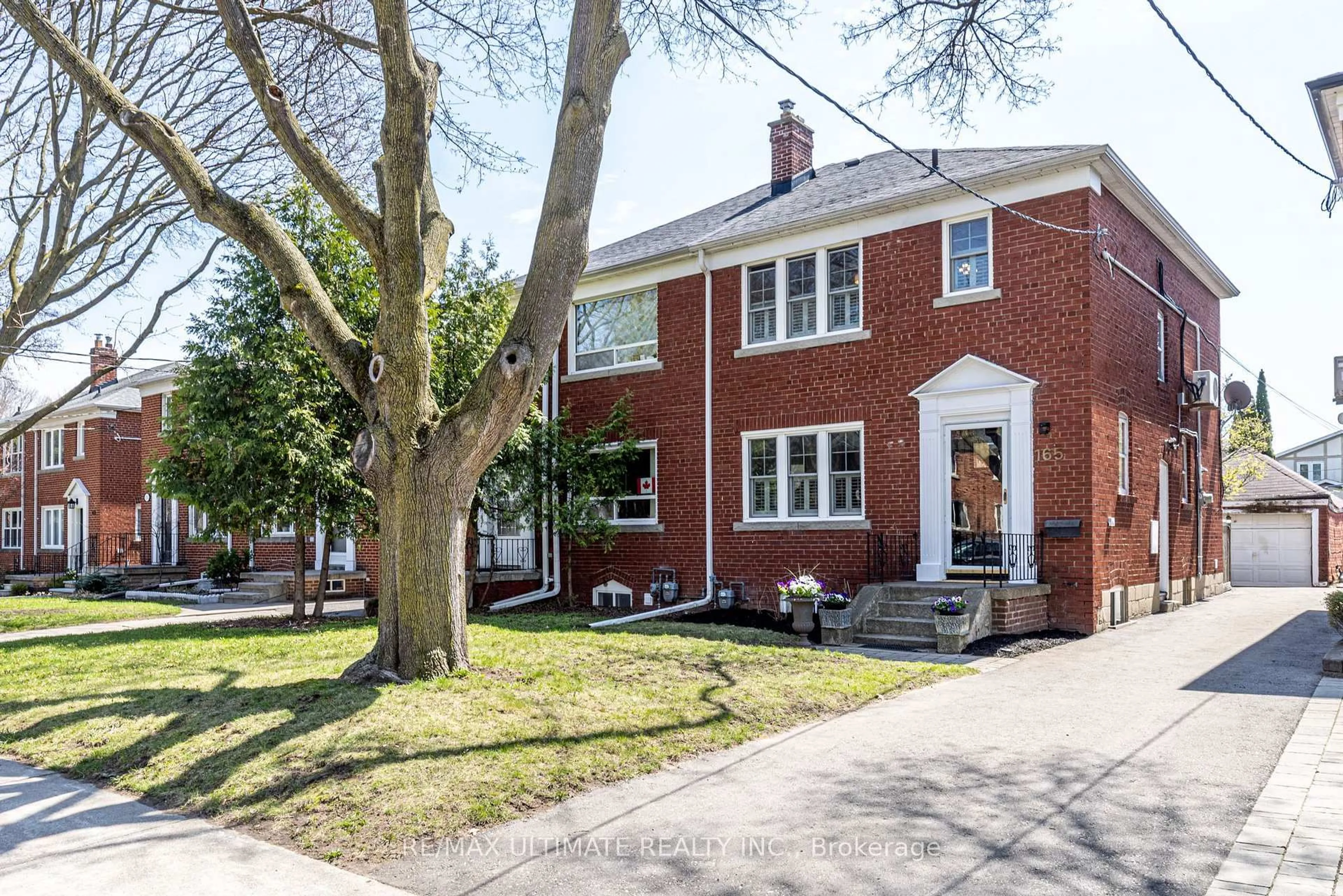 Home with brick exterior material, street for 165 Divadale Dr, Toronto Ontario M4G 2P5