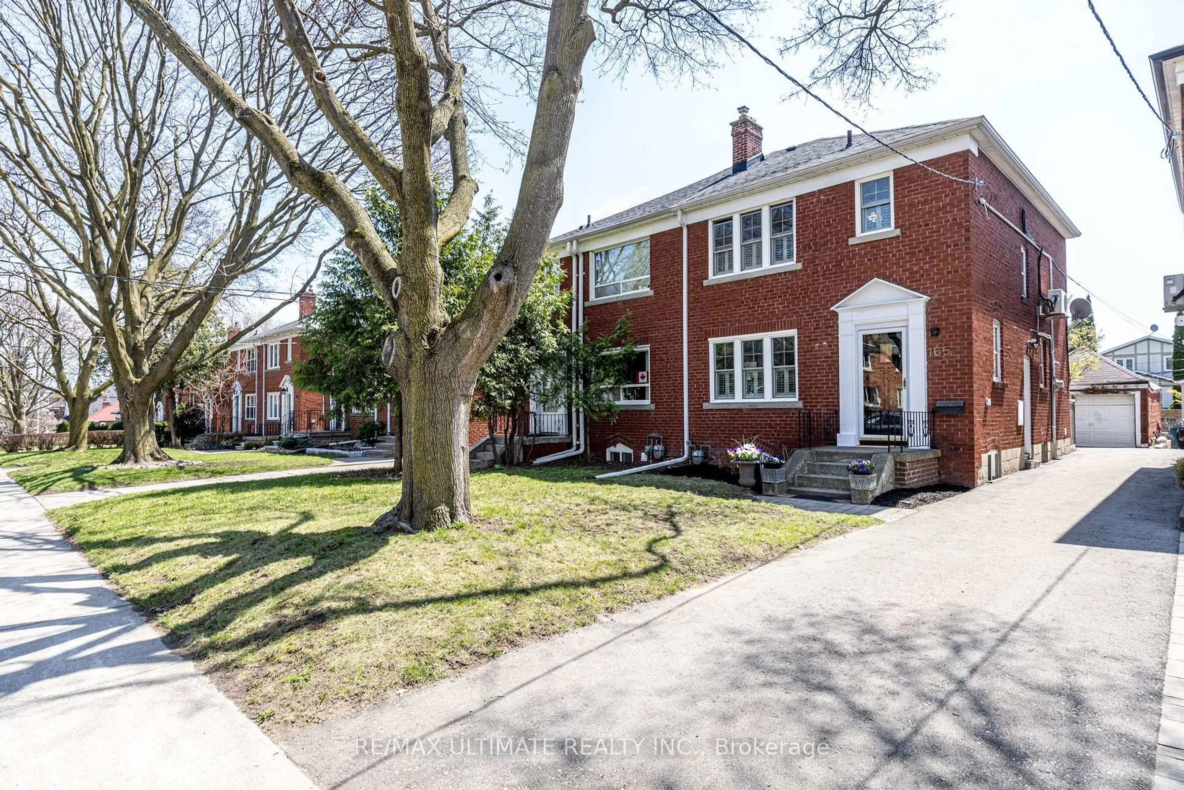 Home with brick exterior material, street for 165 Divadale Dr, Toronto Ontario M4G 2P5