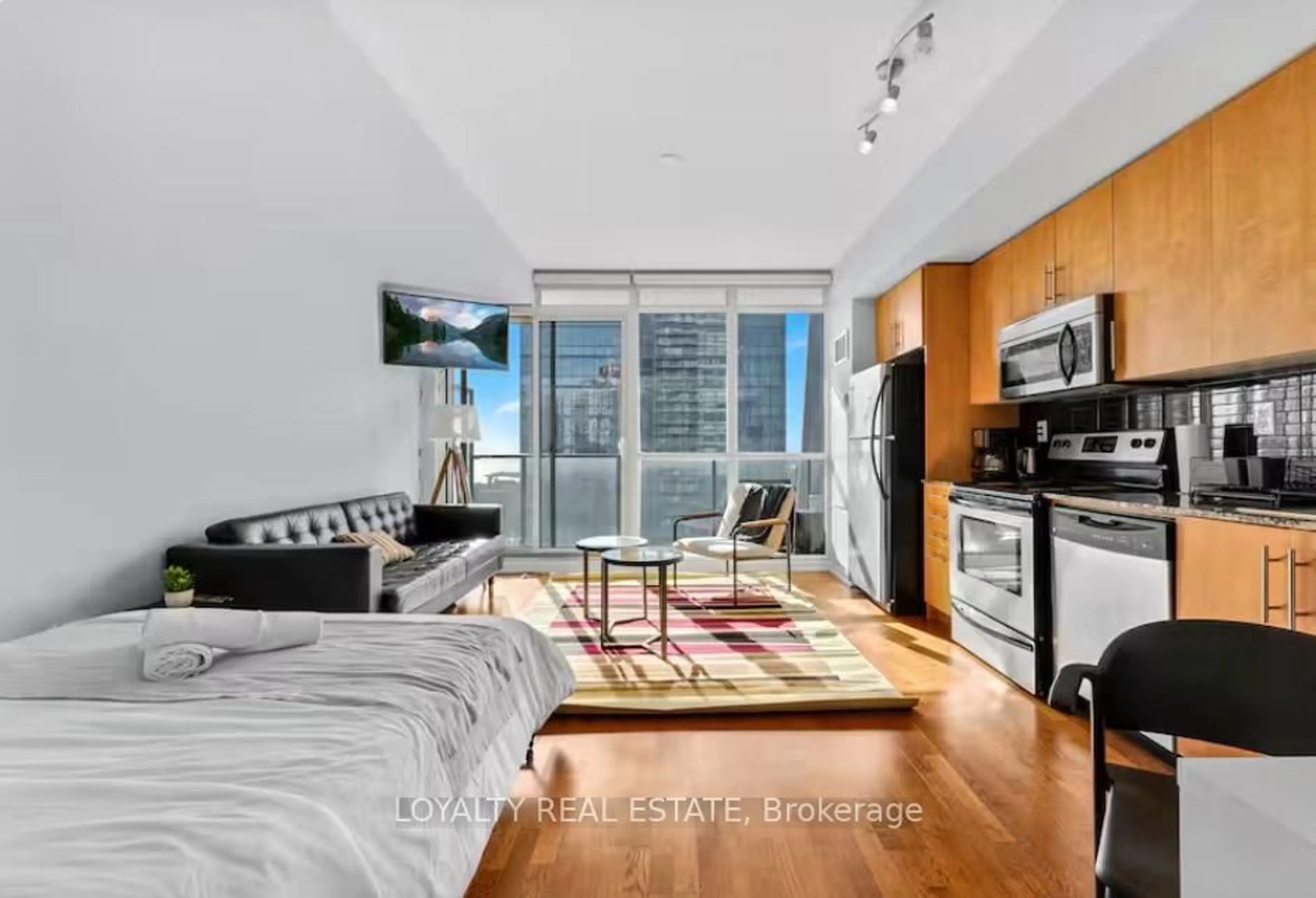 Living room with furniture, unknown for 65 Bremner Blvd #3503, Toronto Ontario M5J 0A7