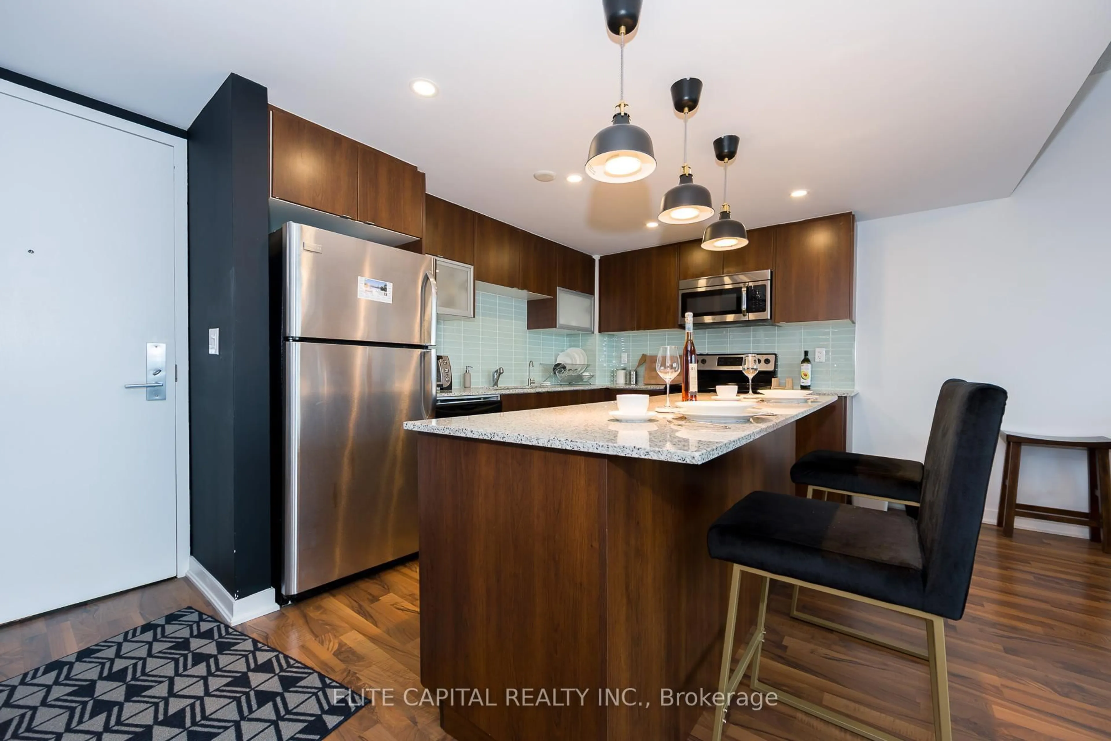 Open concept kitchen, wood/laminate floor for 59 East Liberty St #2207, Toronto Ontario M6K 3R1