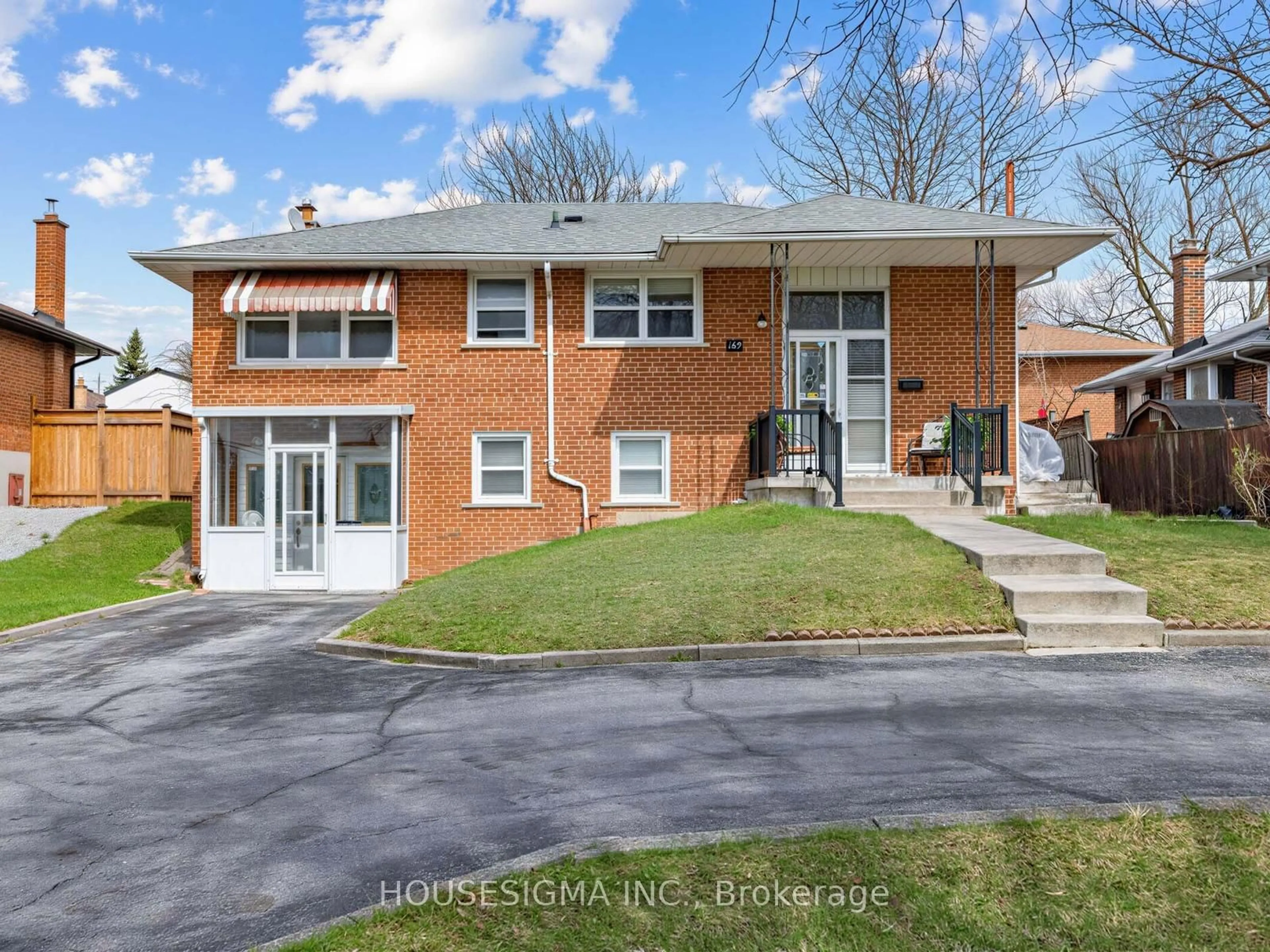 Home with brick exterior material, street for 169 Sloane Ave, Toronto Ontario M4A 2C2