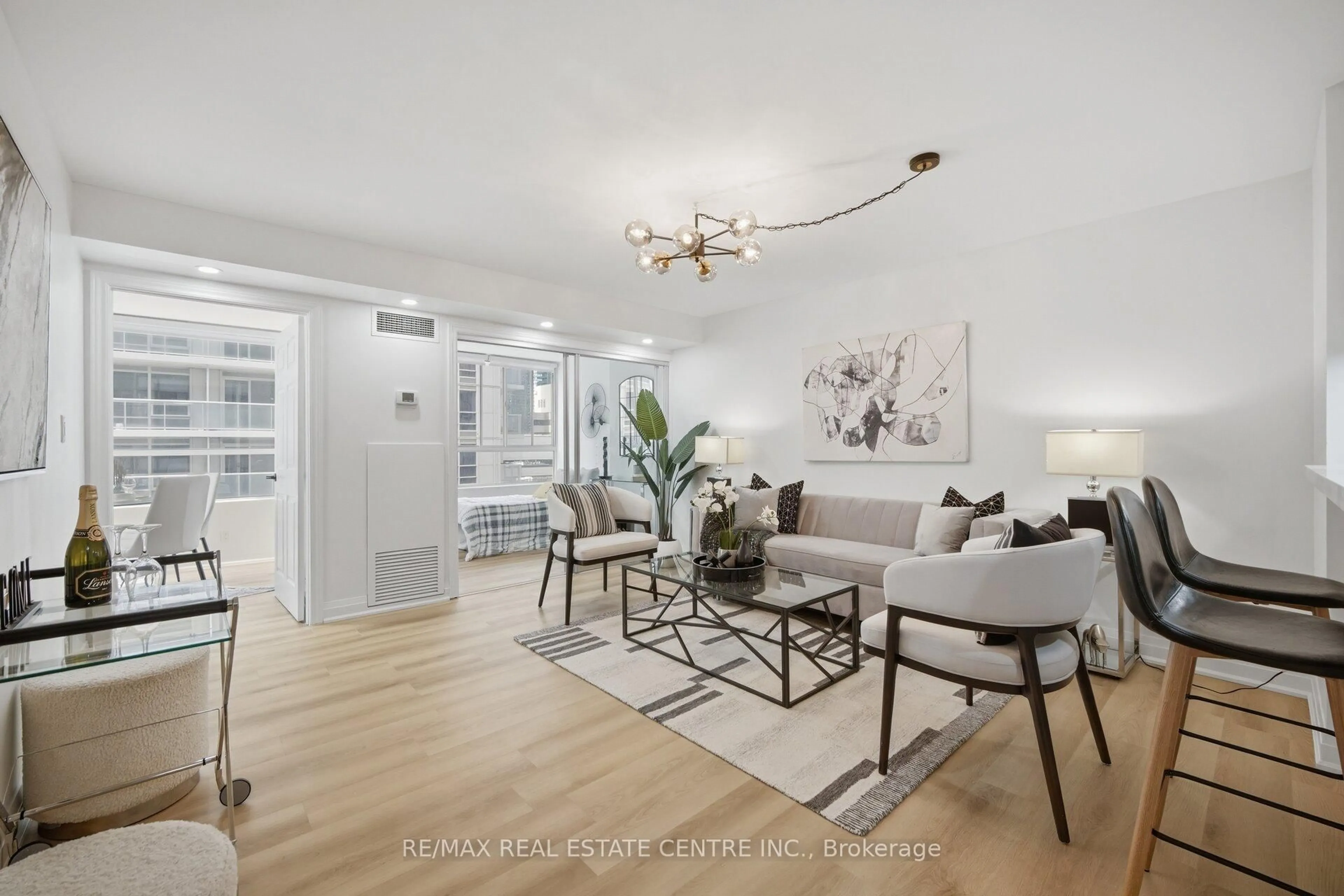 Living room with furniture, unknown for 717 Bay St #1009, Toronto Ontario M5G 2J9