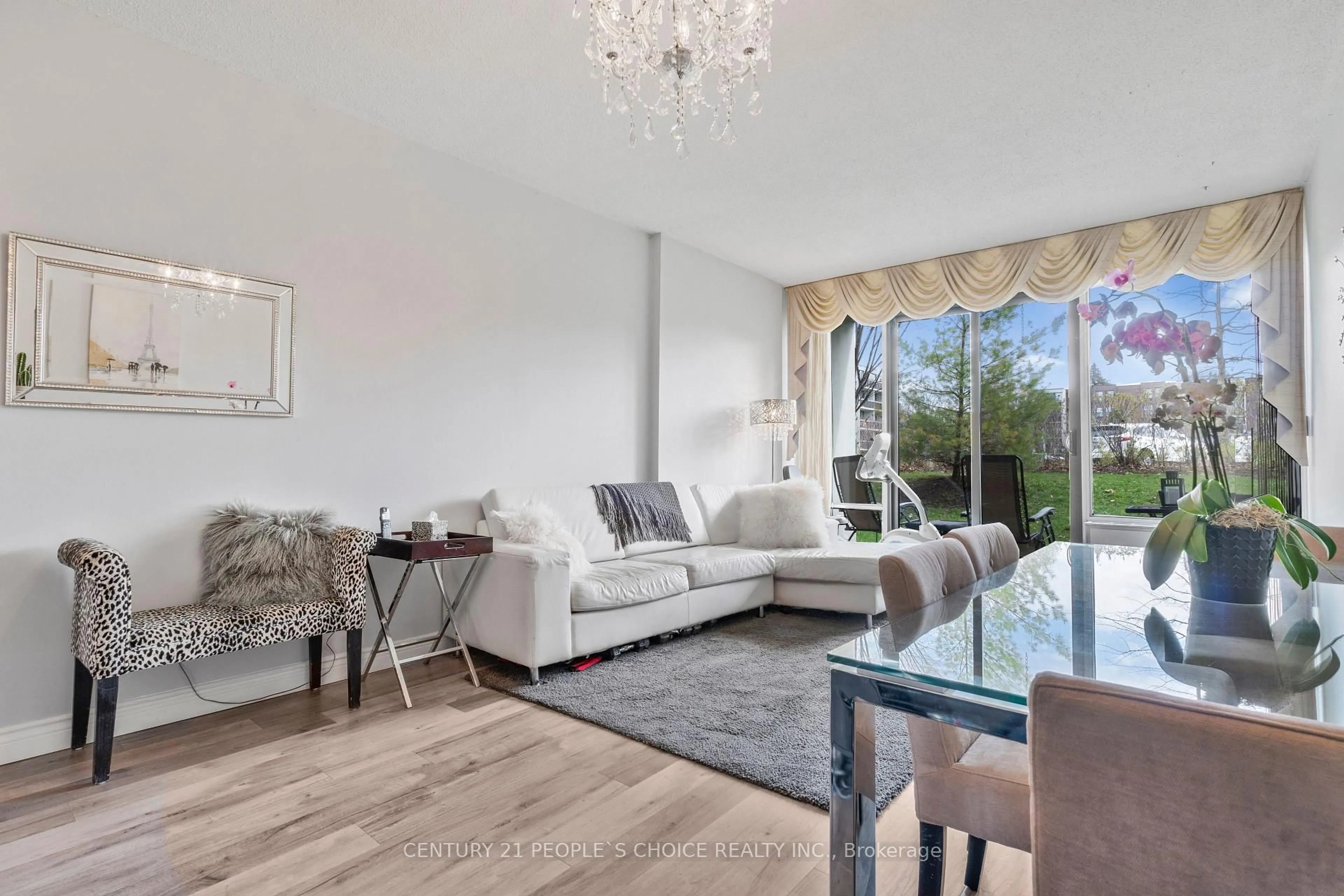 Living room with furniture, wood/laminate floor for 20 Fashion Roseway #105, Toronto Ontario M2N 6B5