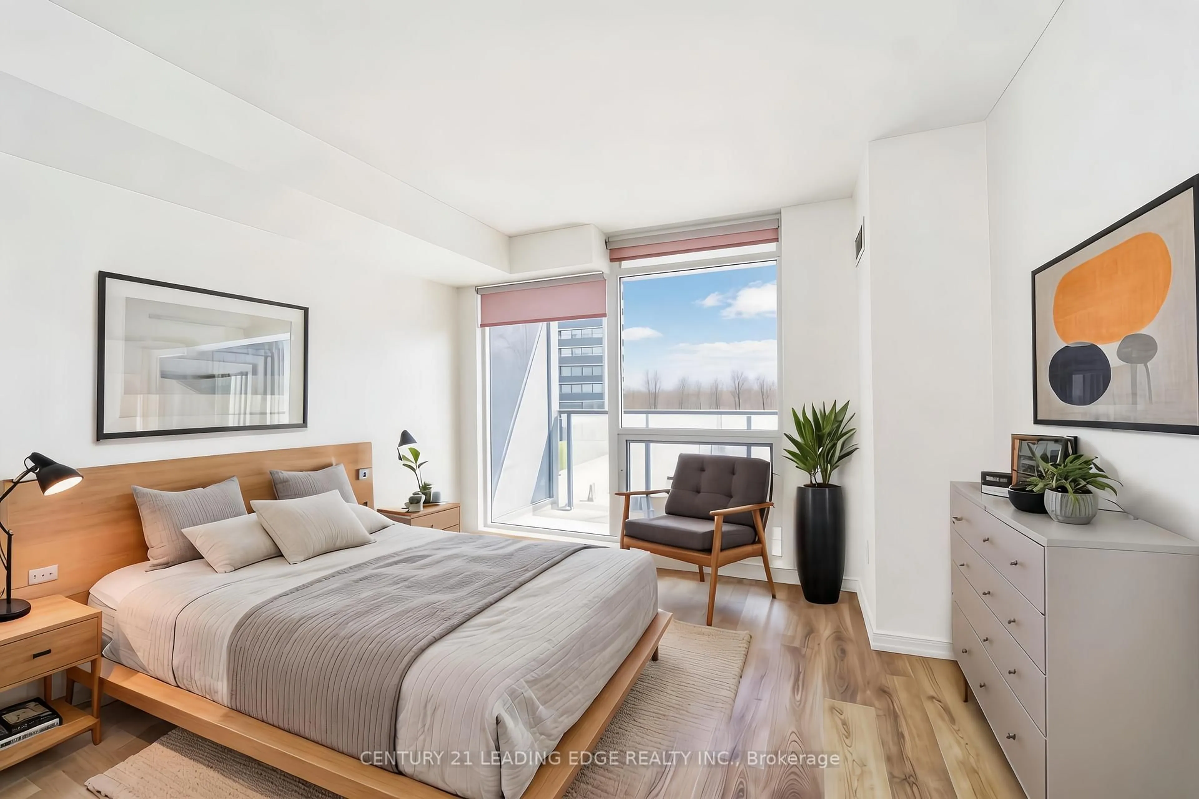 Bedroom with bed, wood/laminate floor for 18 Valley Woods Rd #413, Toronto Ontario M3A 0A1
