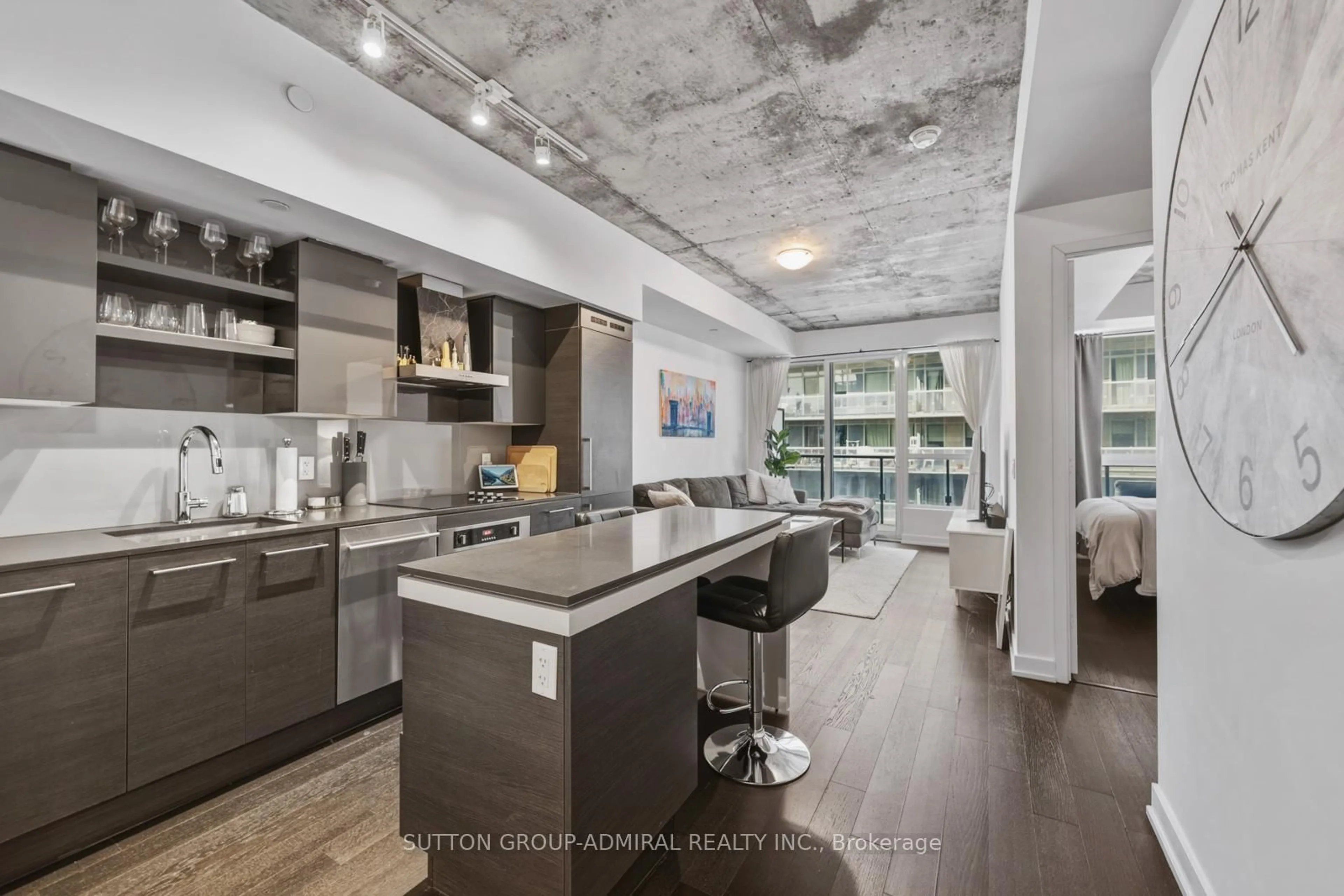 Open concept kitchen, cement floor for 1030 King St #921, Toronto Ontario M6K 0B4