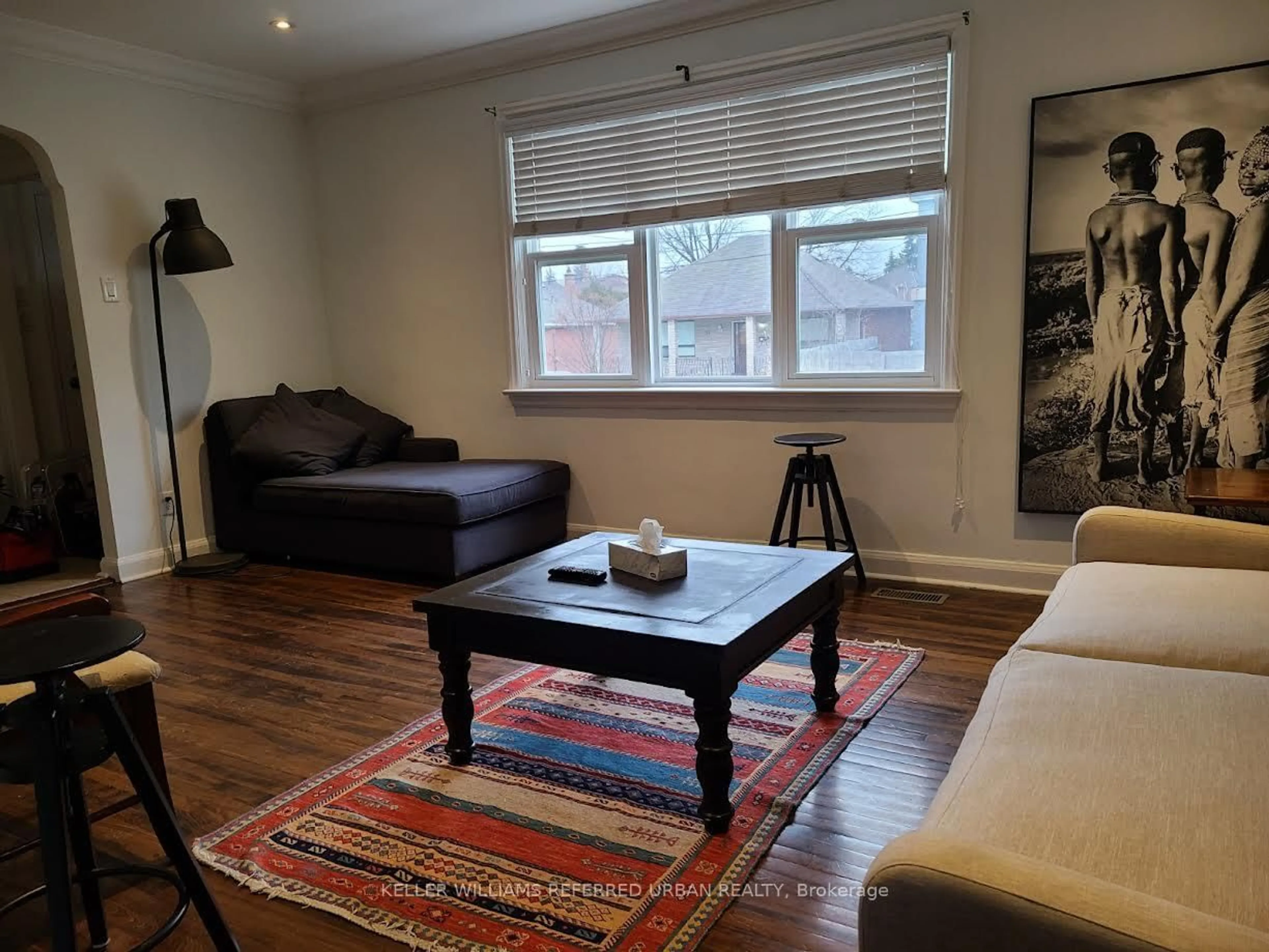 Living room with furniture, wood/laminate floor for 94 Fairholme Ave, Toronto Ontario M6B 2W6