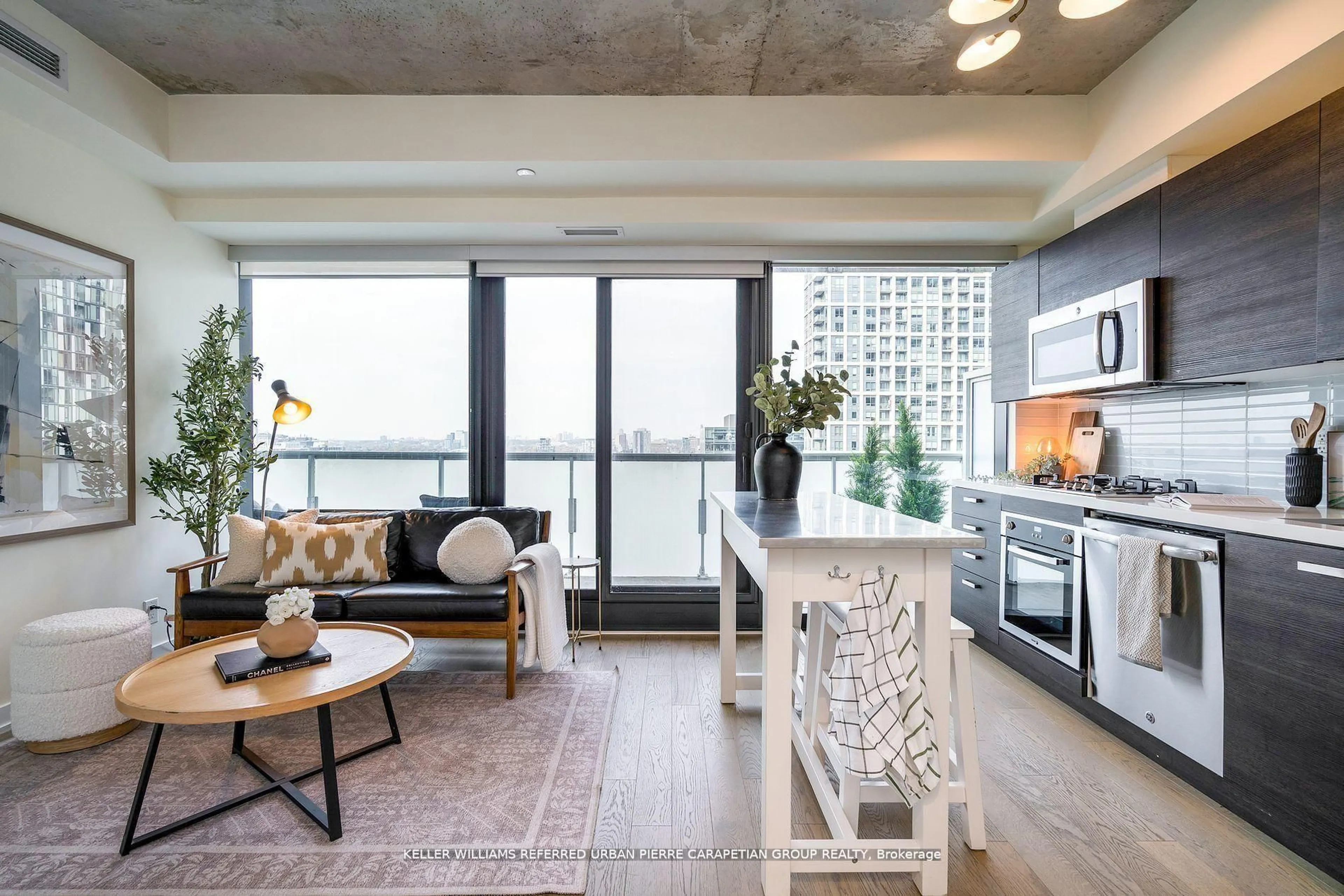 Open concept kitchen, cement floor for 11 Charlotte St #2004, Toronto Ontario M5V 0M6
