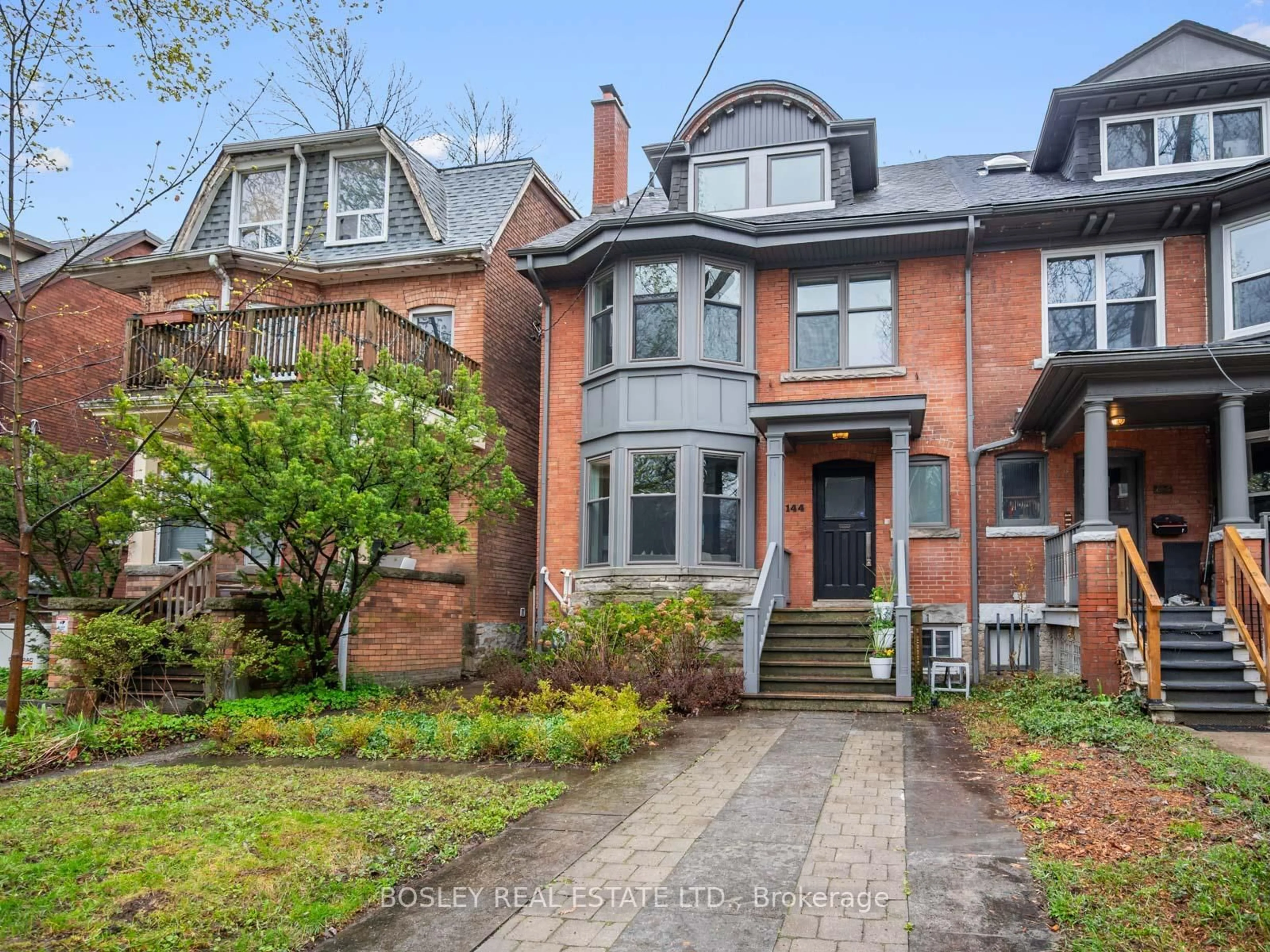 Home with brick exterior material, street for 144 Howland Ave, Toronto Ontario M5R 3B5