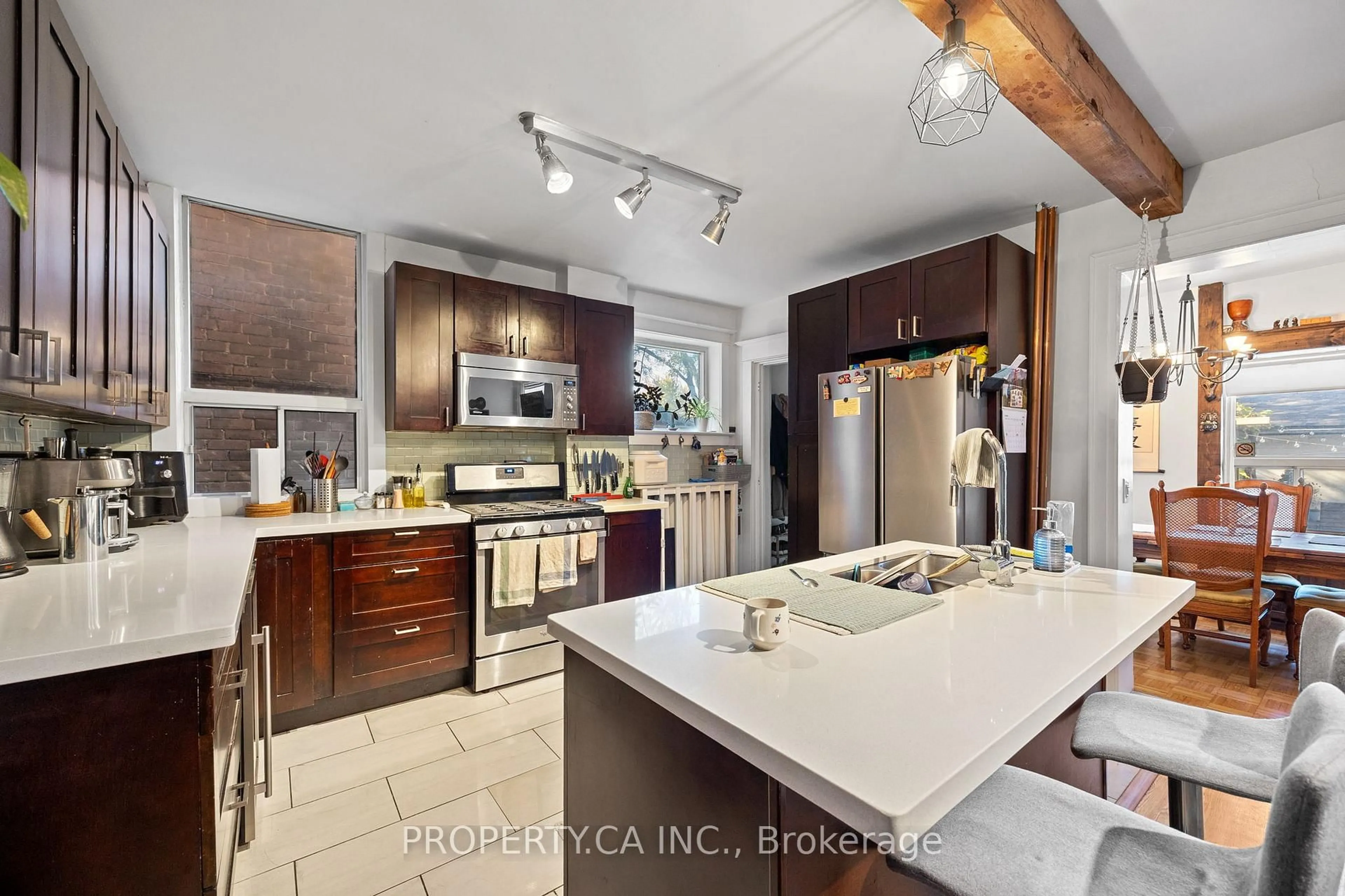 Open concept kitchen, ceramic/tile floor for 396 Roxton Rd, Toronto Ontario M6G 3R2