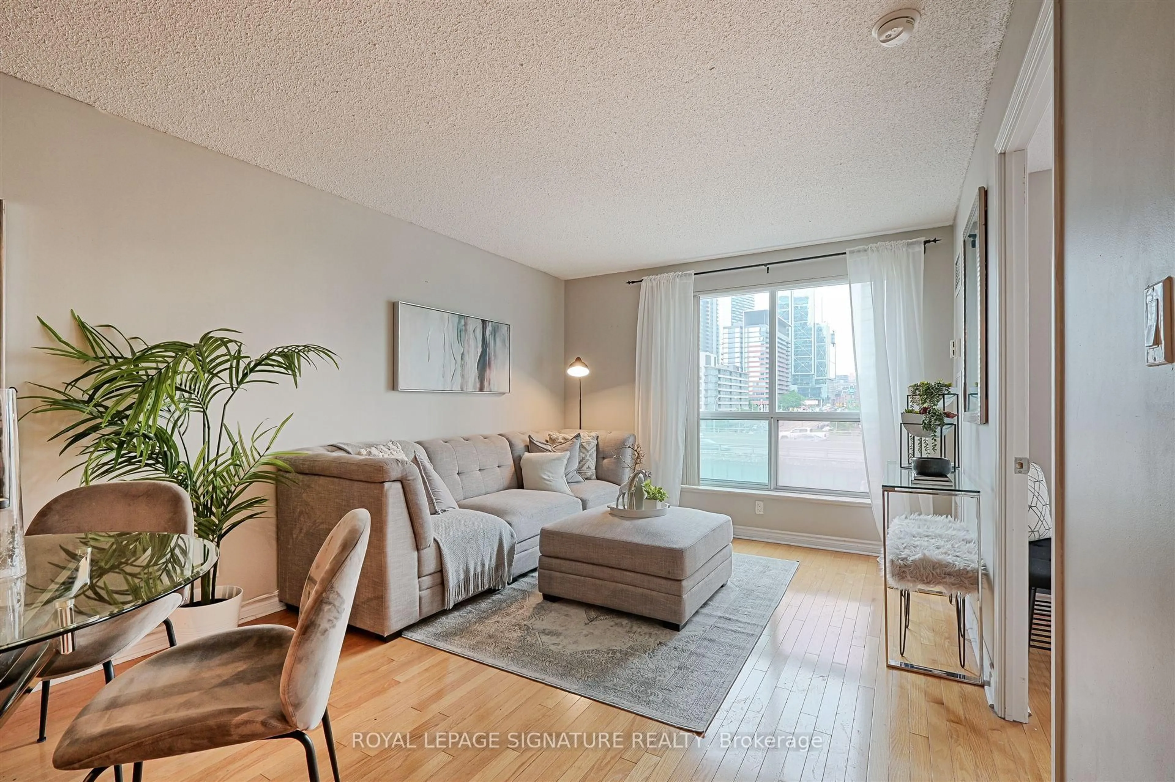 Living room with furniture, wood/laminate floor for 410 Queens Quay #505, Toronto Ontario M5V 3T1