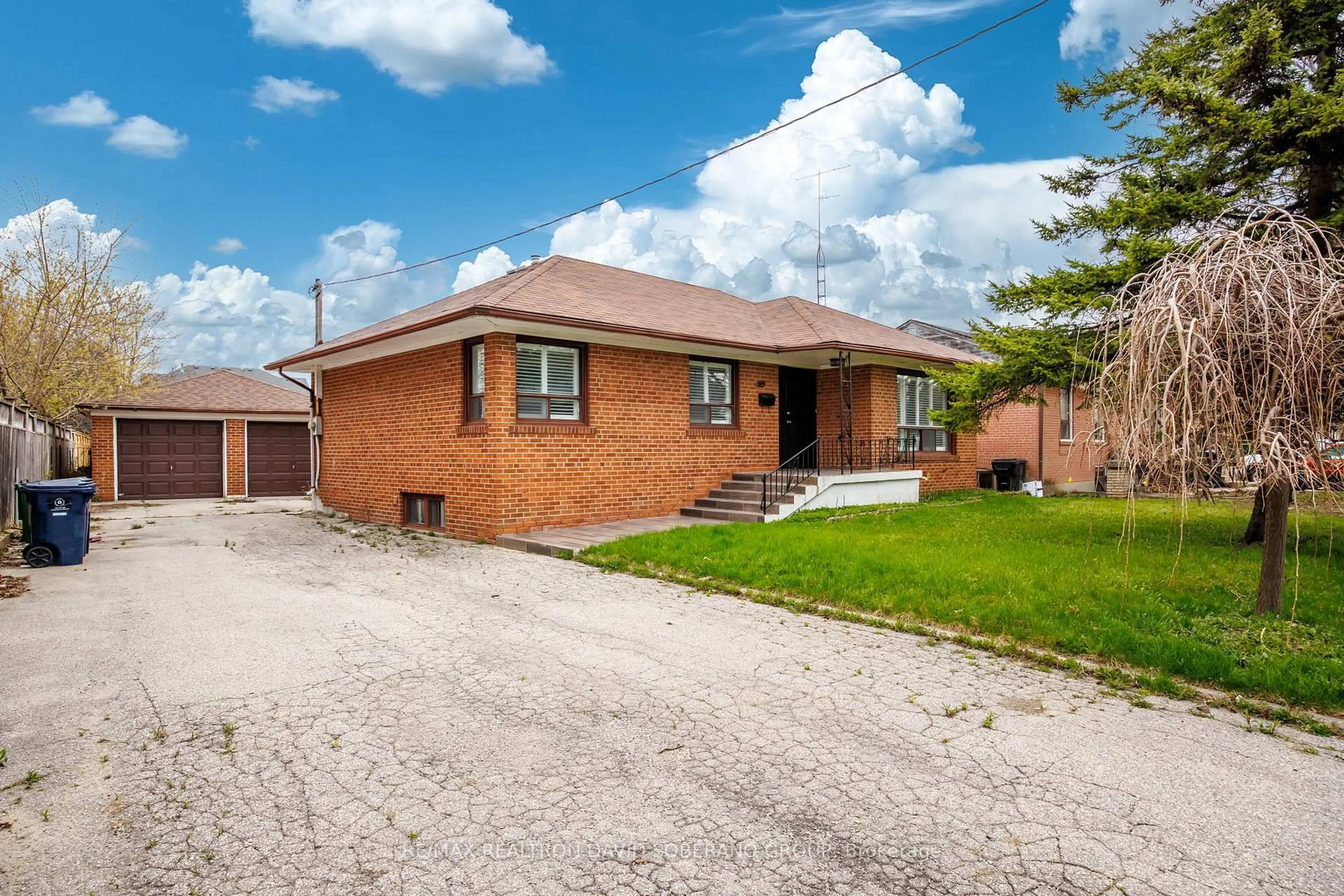 Home with brick exterior material, street for 16 Faith Ave, Toronto Ontario M3H 1W3