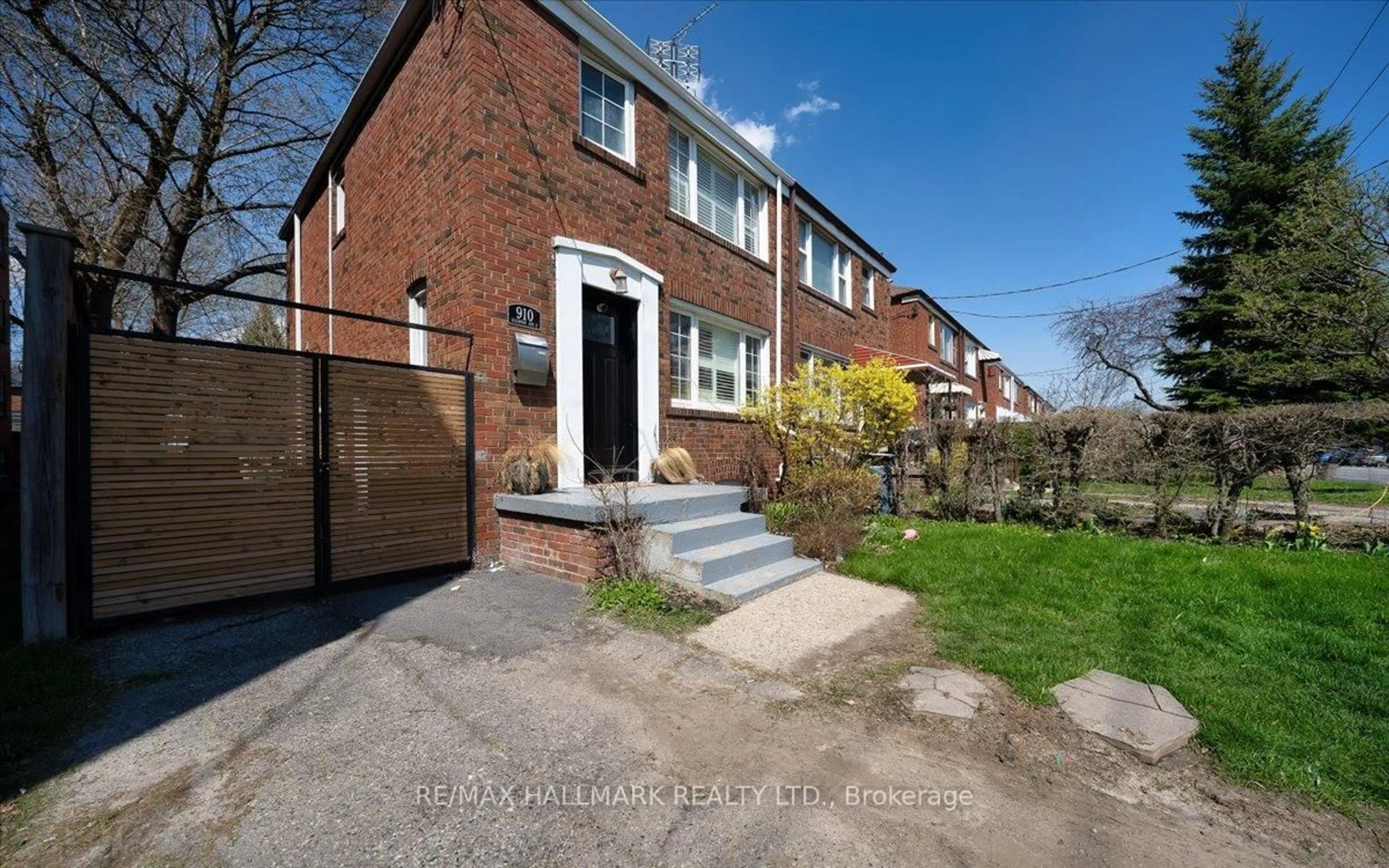 Home with brick exterior material, street for 910 Eglinton Ave, Toronto Ontario M4G 2L3