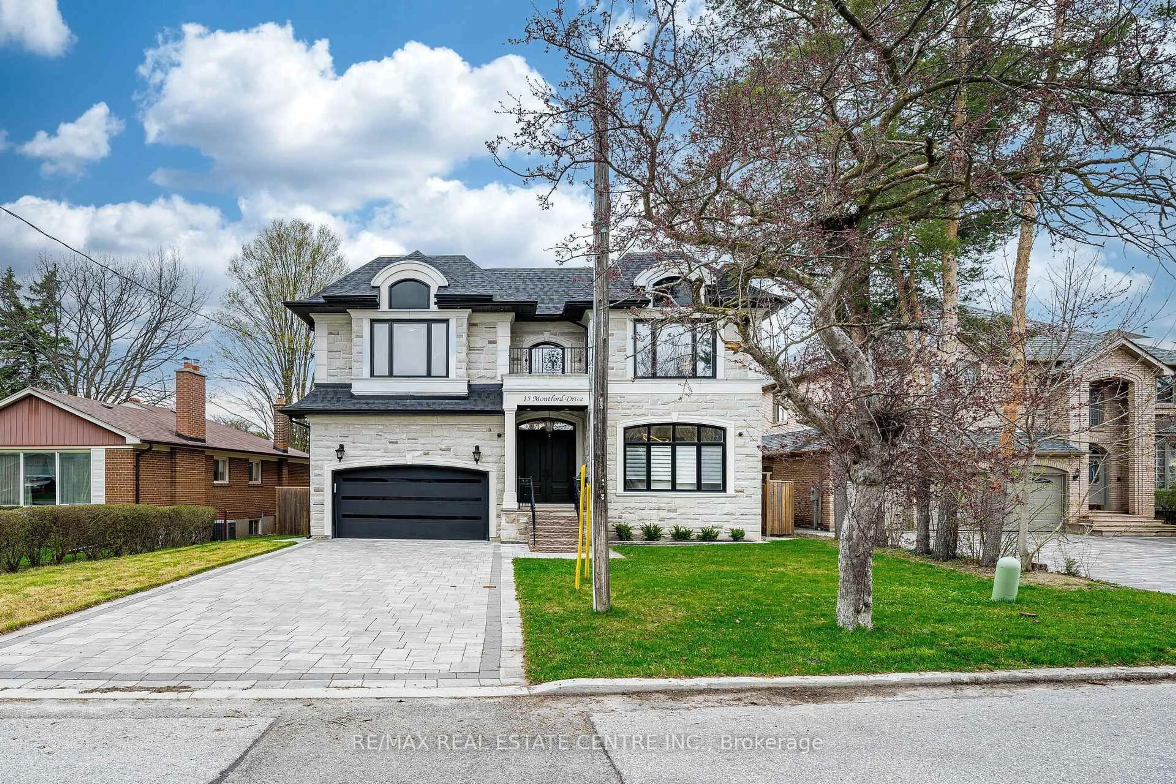 Home with brick exterior material, street for 15 Montford Dr, Toronto Ontario M2M 3H2
