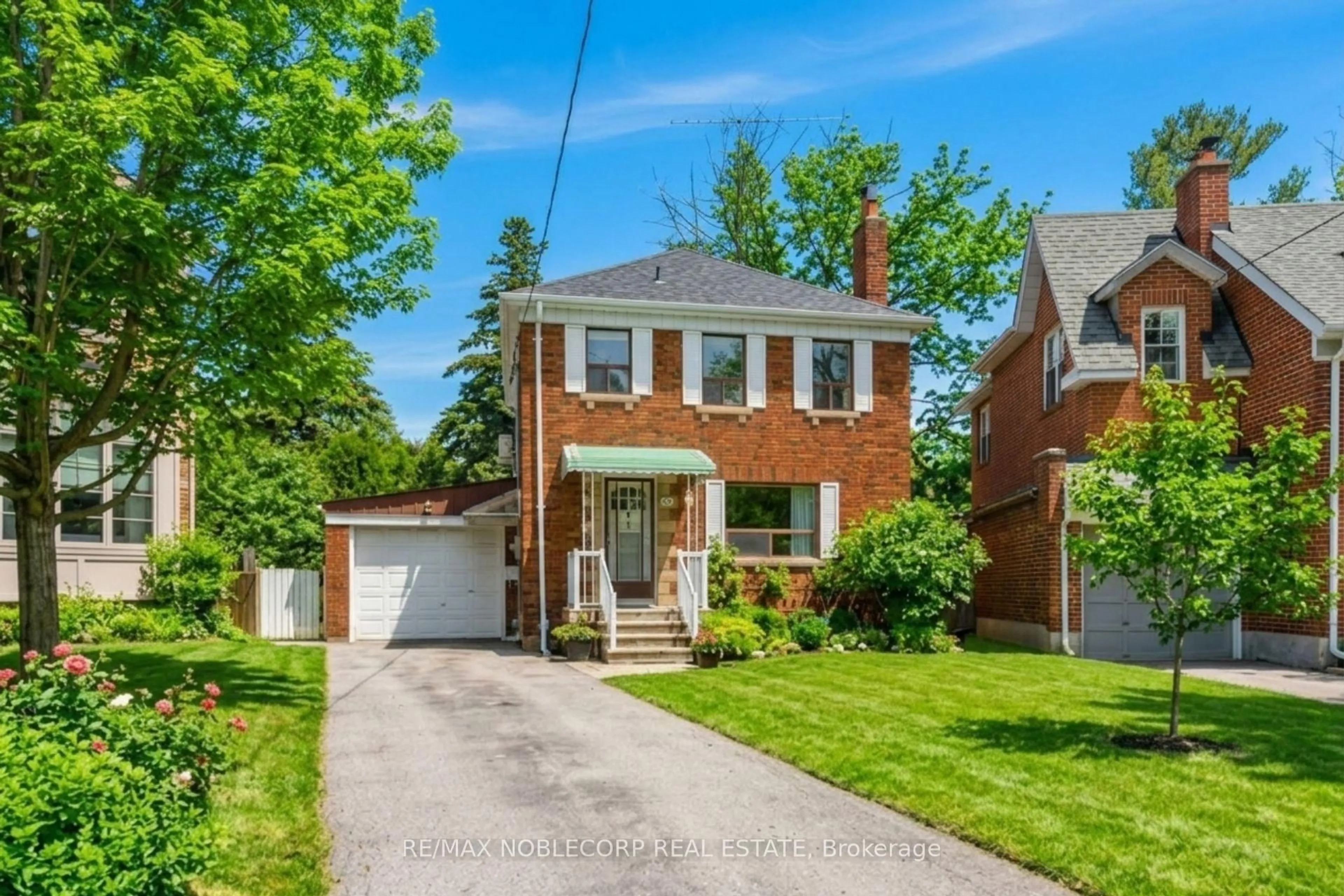 Home with brick exterior material, street for 51 Glenavy Ave, Toronto Ontario M4P 2T9