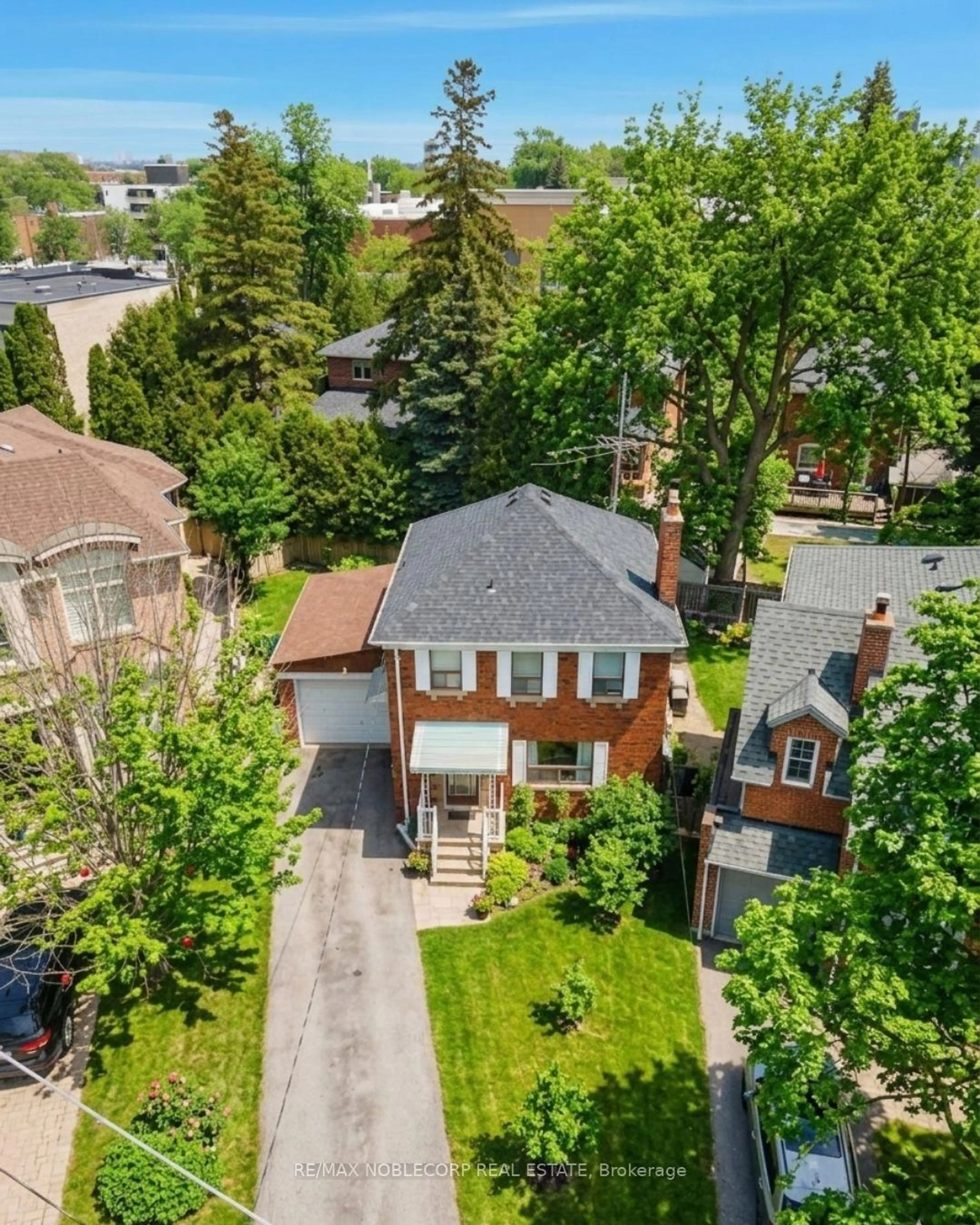 A pic from outside/outdoor area/front of a property/back of a property/a pic from drone, street for 51 Glenavy Ave, Toronto Ontario M4P 2T9