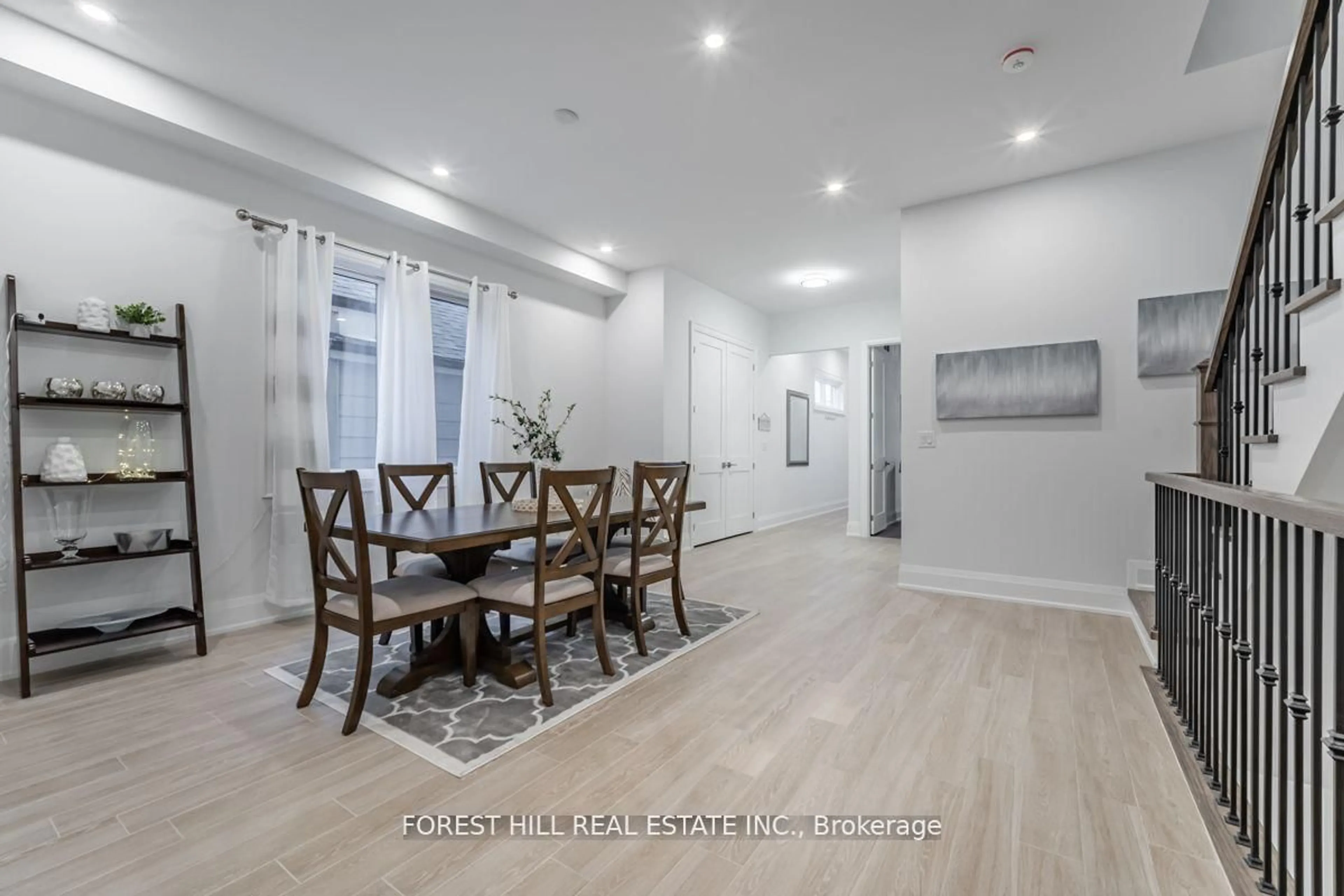 Dining room, wood/laminate floor for 611 Northcliffe Blvd, Toronto Ontario M6E 3L8