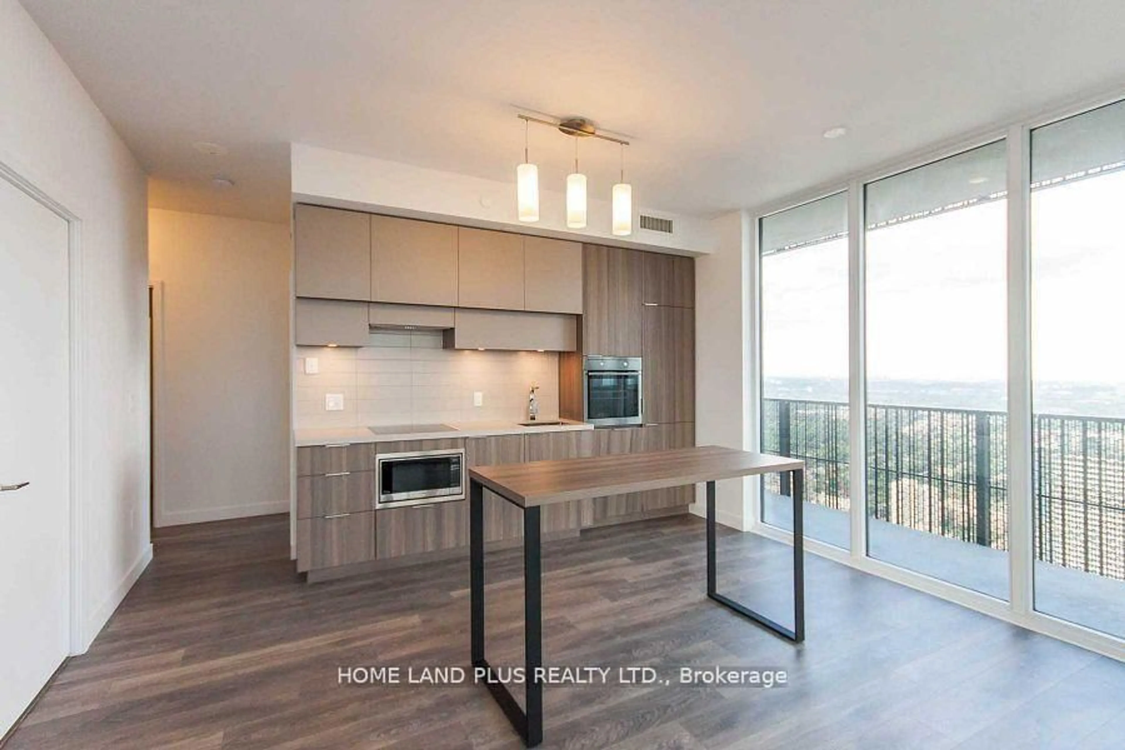 Open concept kitchen, wood/laminate floor for 8 Eglinton Ave #5111, Toronto Ontario M4P 0C1