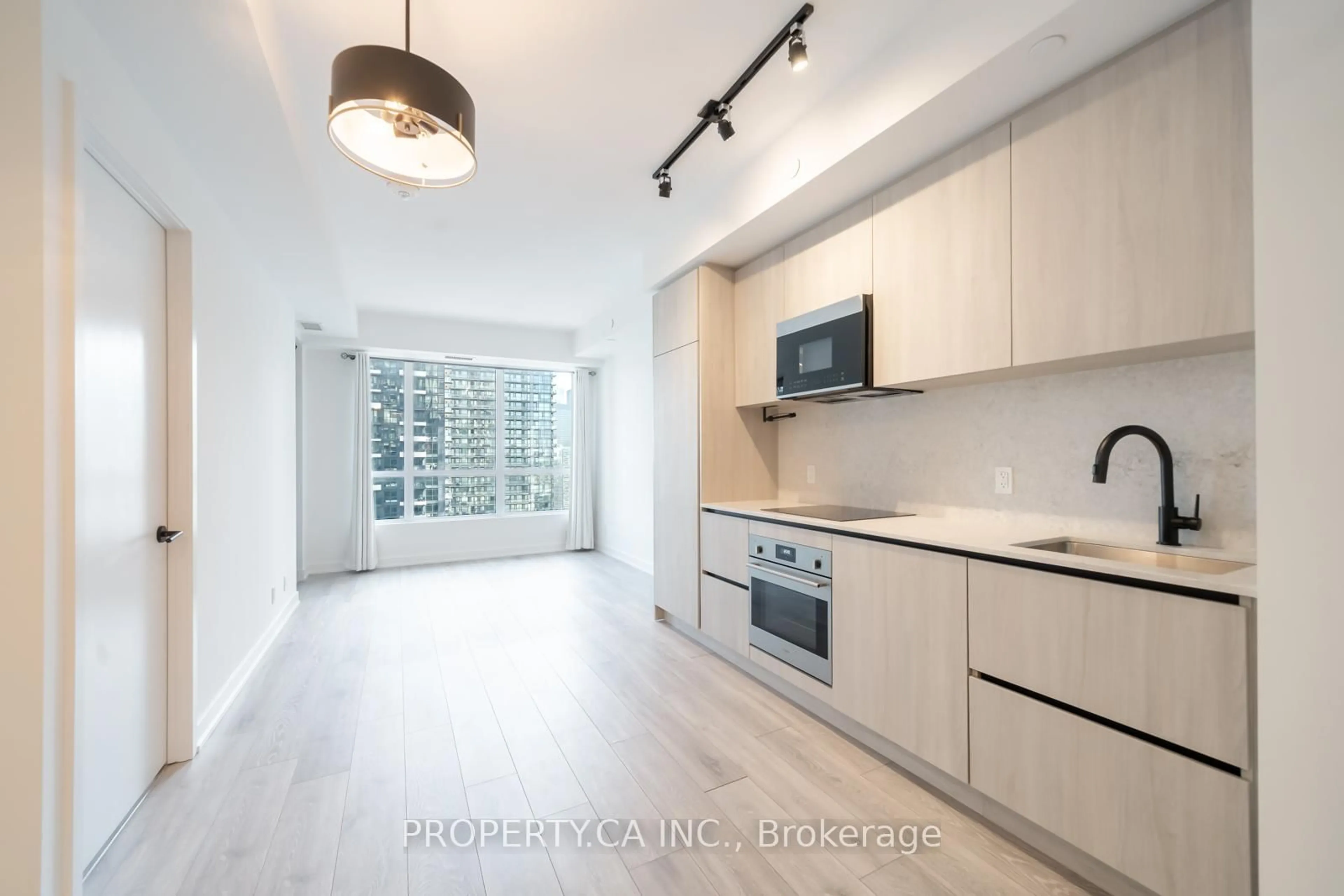 Open concept kitchen, unknown for 108 Peter St #3203, Toronto Ontario M5V 0W2