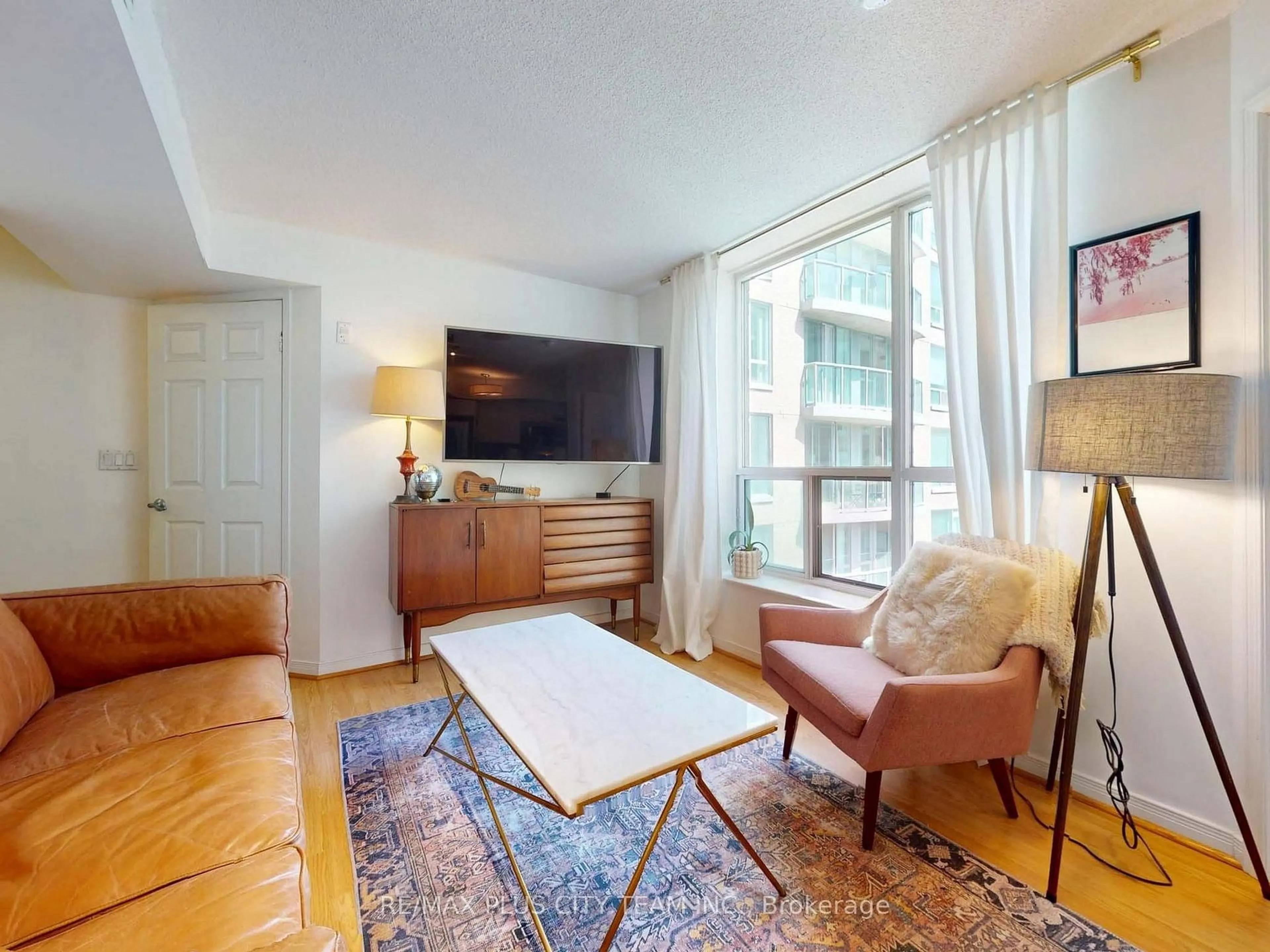 Living room with furniture, unknown for 109 Front St #721, Toronto Ontario M5A 4P7