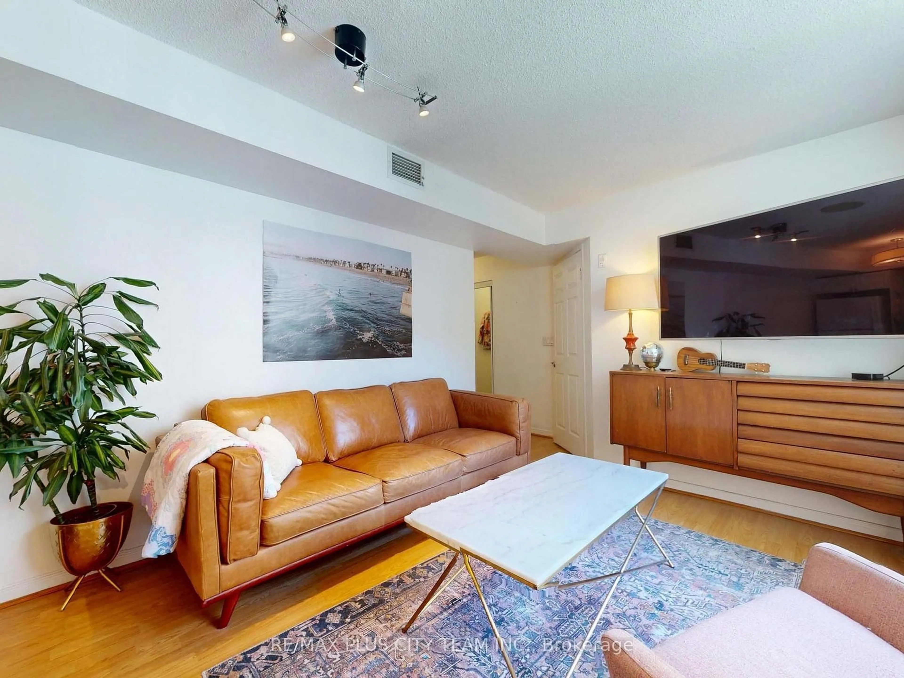 Living room with furniture, unknown for 109 Front St #721, Toronto Ontario M5A 4P7