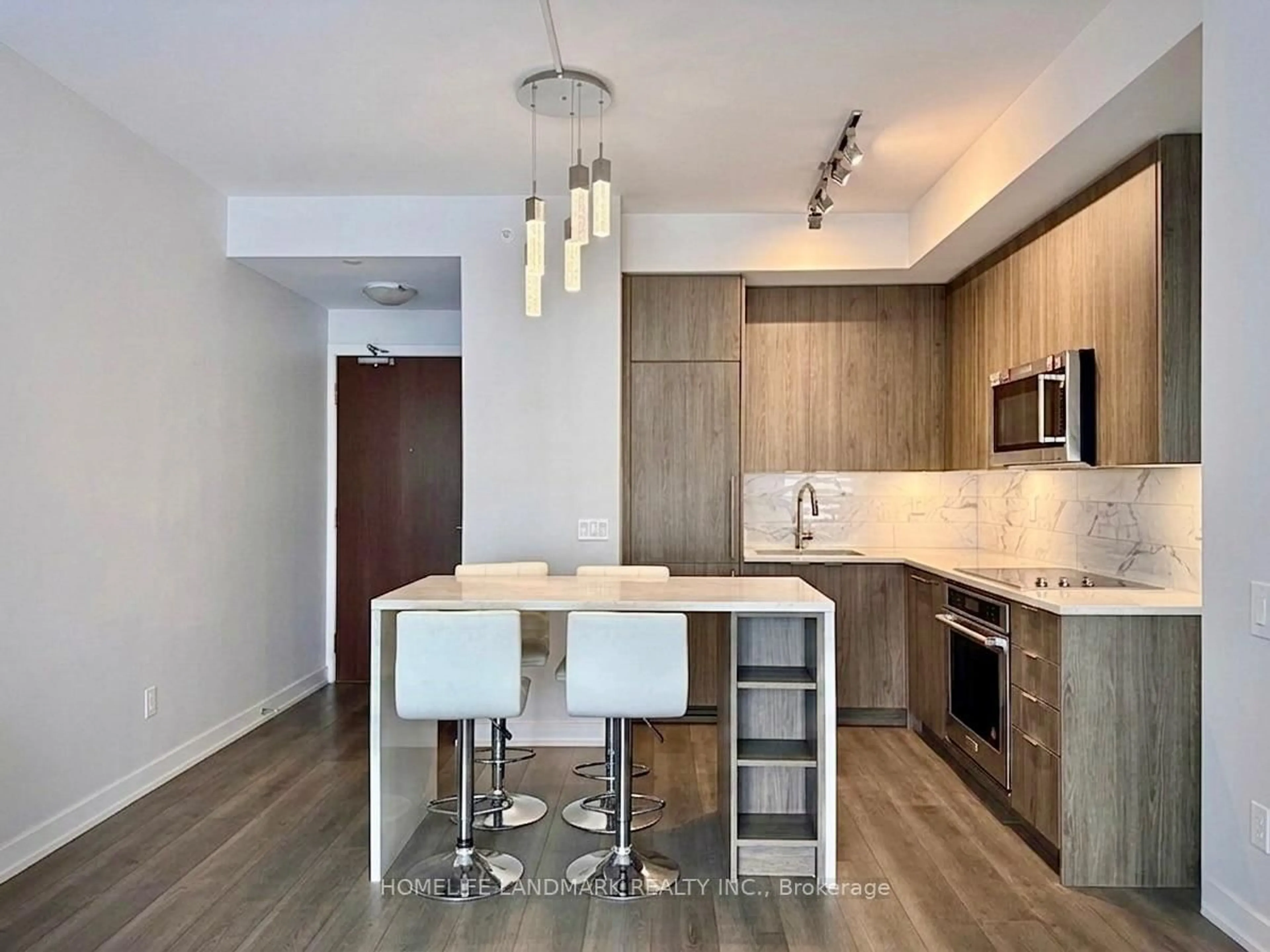 Open concept kitchen, wood/laminate floor for 38 Iannuzzi St #1701, Toronto Ontario M5V 0S2