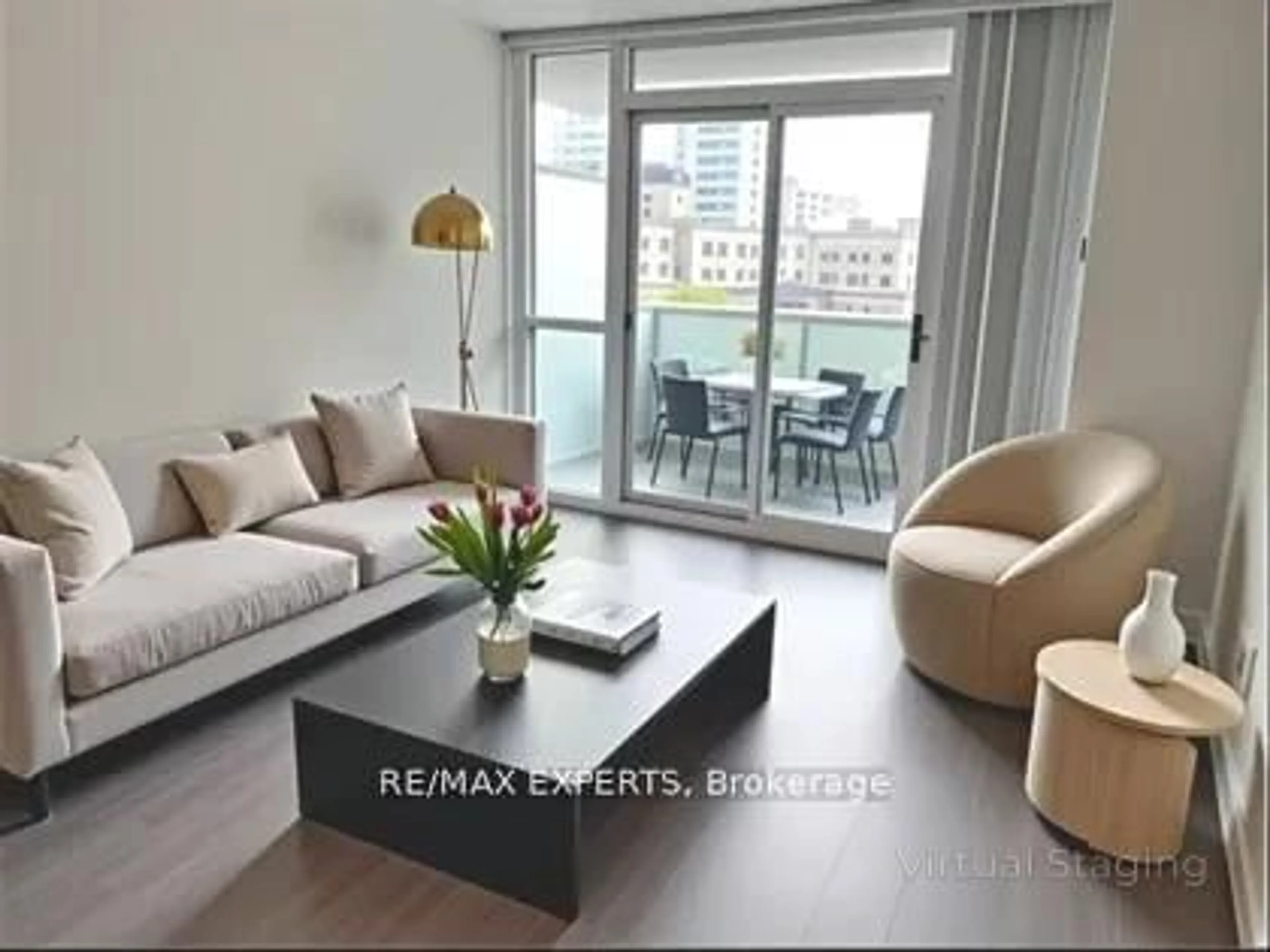 Living room with furniture, wood/laminate floor for 25 Lower Simcoe St #728, Toronto Ontario M5J 3A1