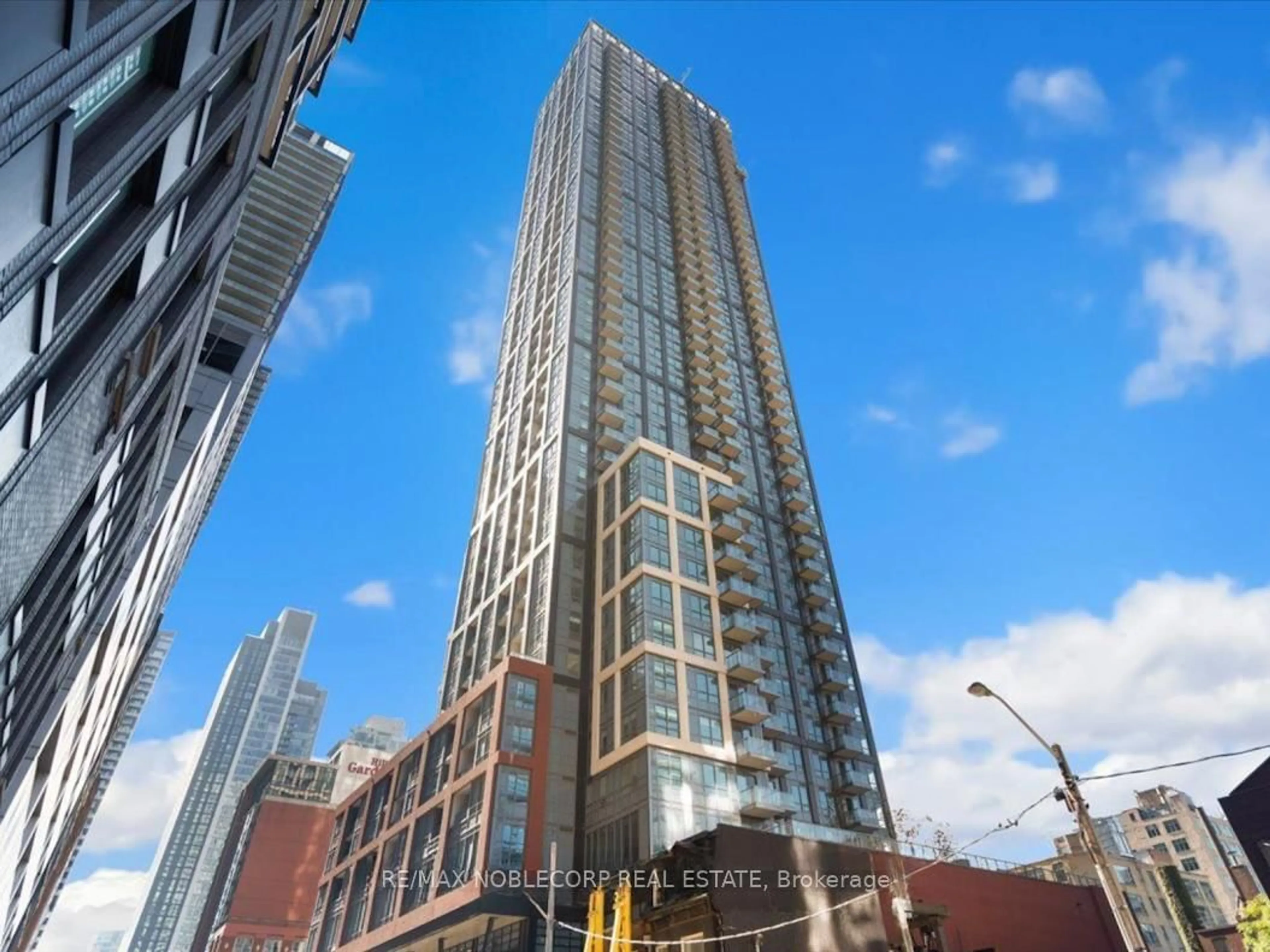 A pic from outside/outdoor area/front of a property/back of a property/a pic from drone, building for 108 Peter St #712, Toronto Ontario M5V 0W2