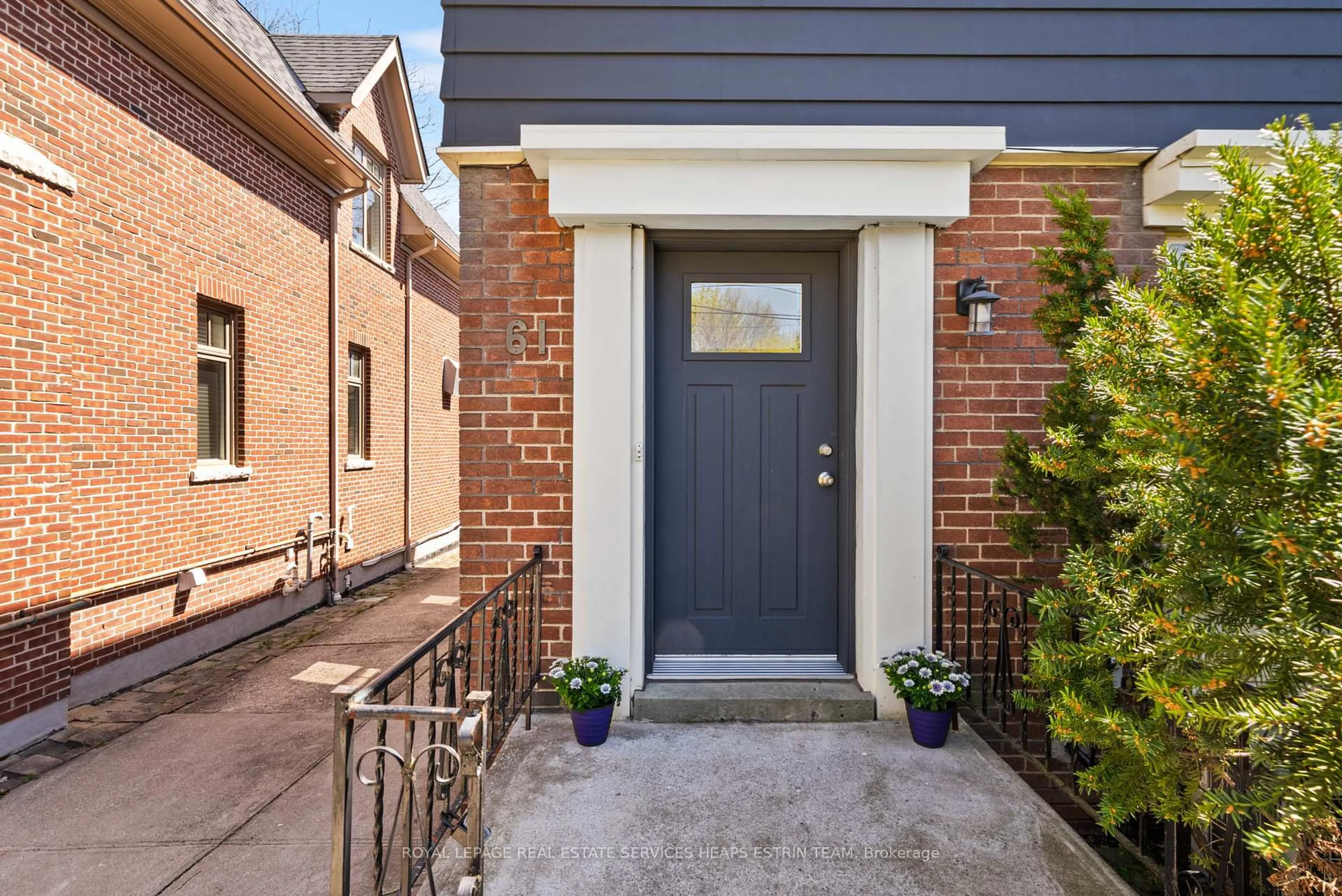 Home with brick exterior material, street for 61 Sutherland Dr, Toronto Ontario M4G 1H5