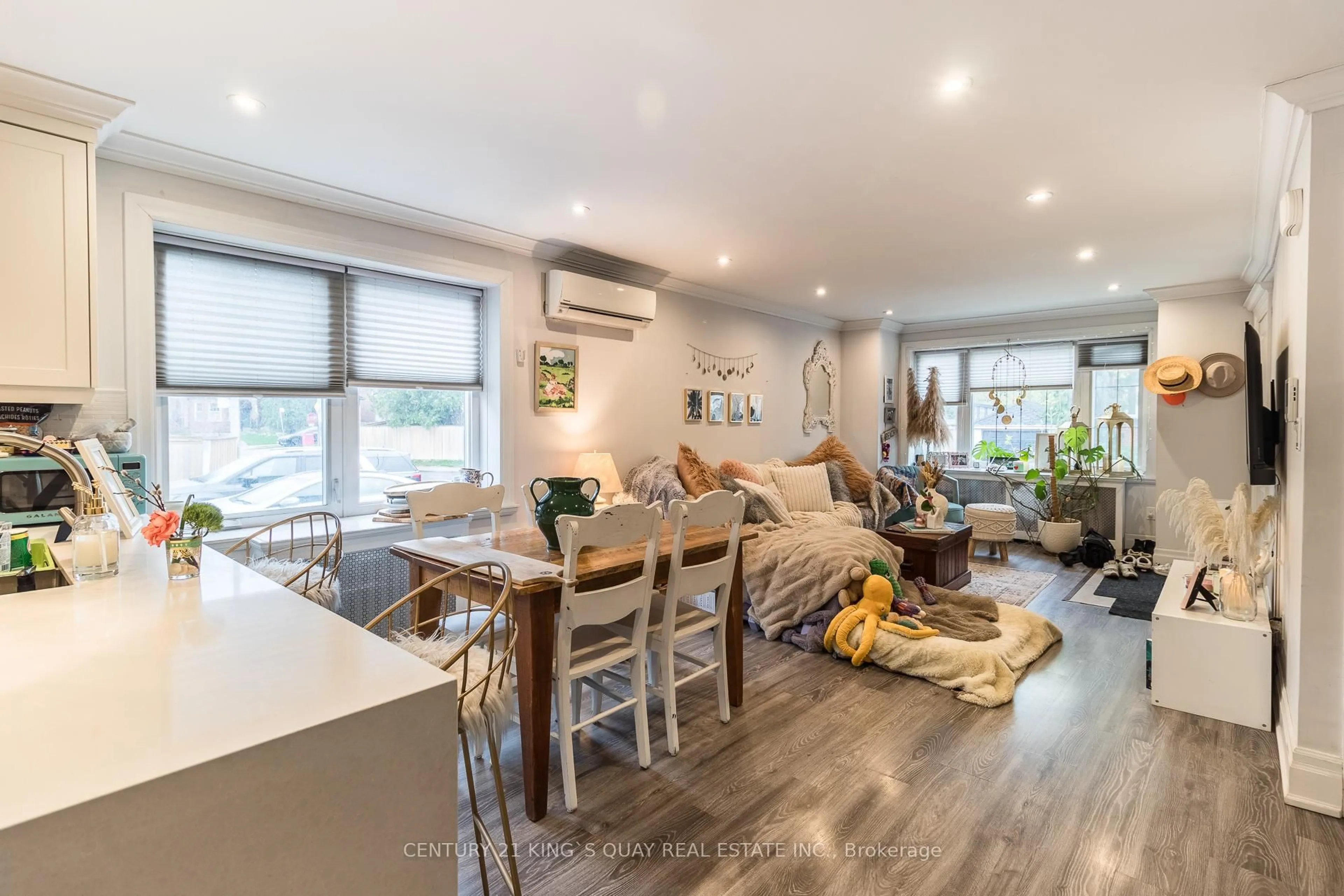 Open concept kitchen, wood/laminate floor for 301 Cleveland St, Toronto Ontario M4S 2W7