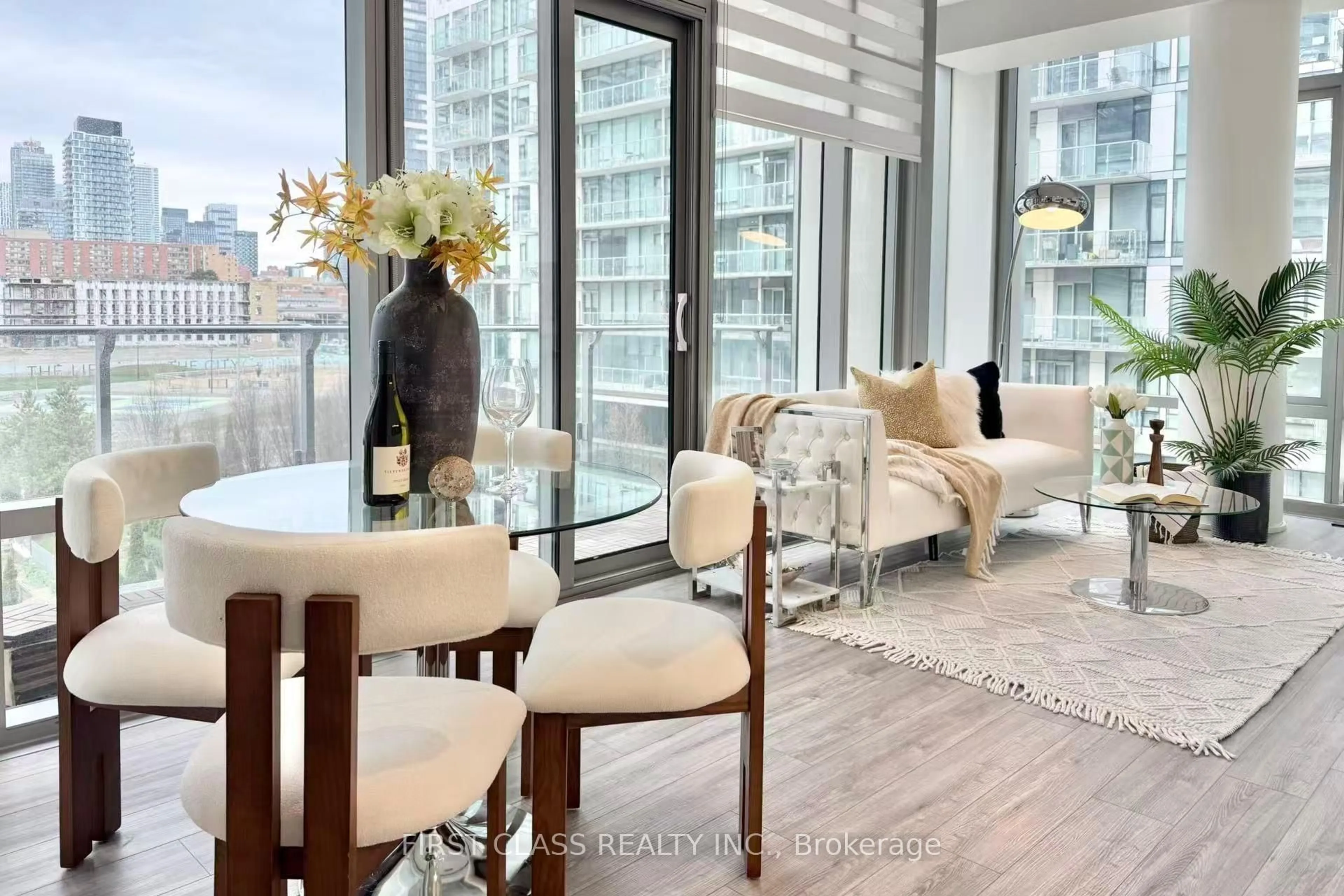 Living room with furniture, wood/laminate floor for 39 Queens Quay #402, Toronto Ontario M5E 0A5