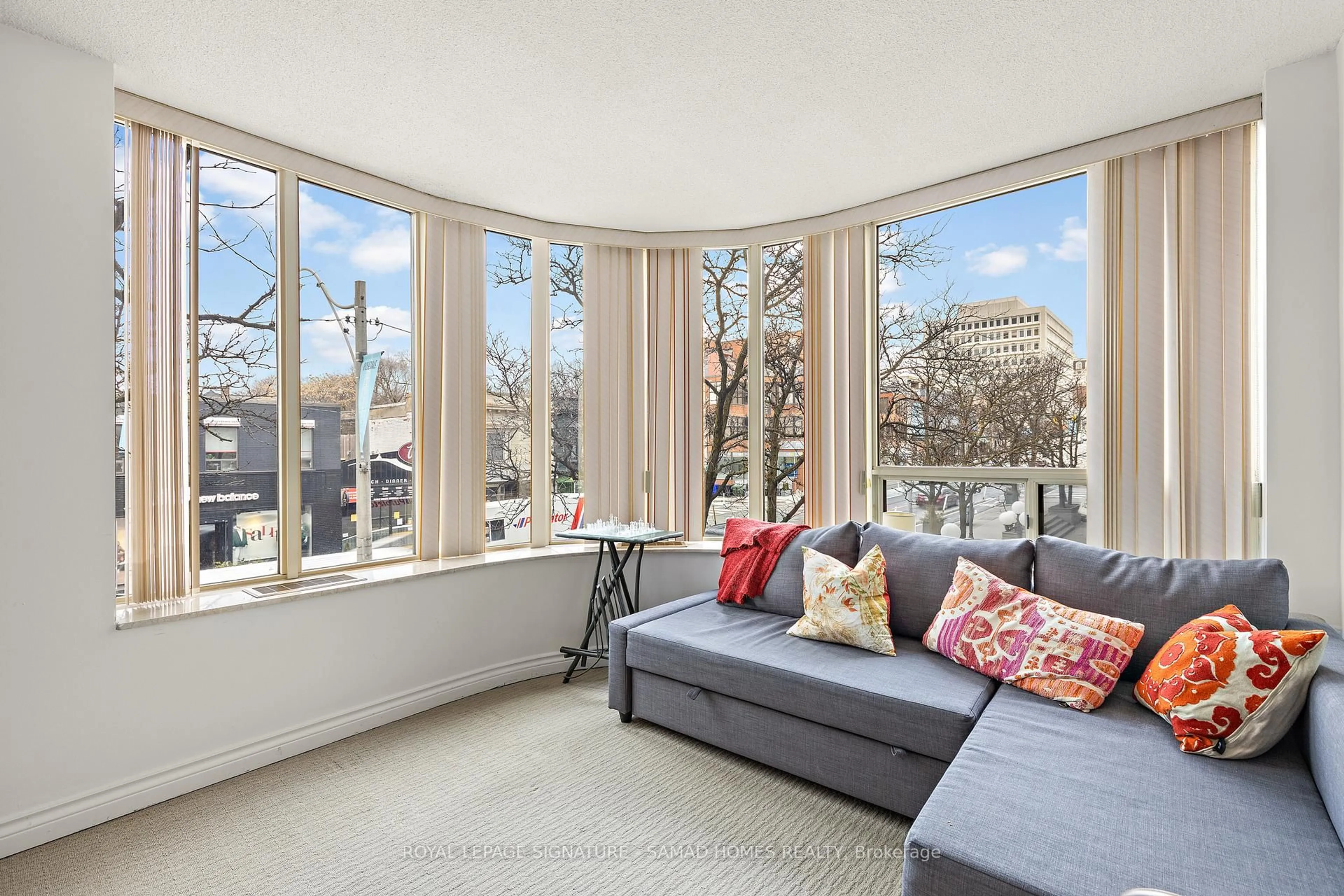 Living room with furniture, unknown for 1177 Yonge St #210, Toronto Ontario M4T 2Y4