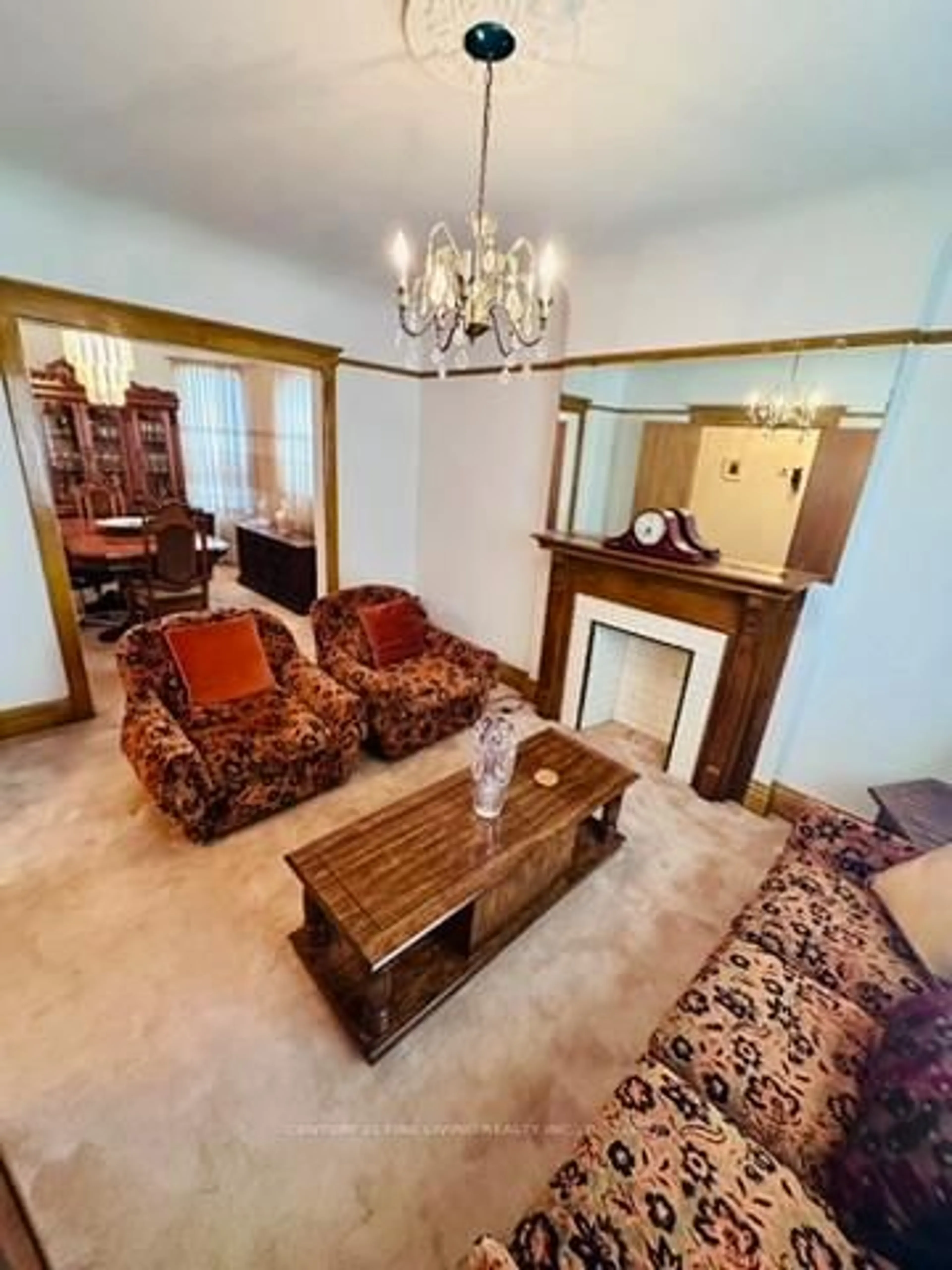 Living room with furniture, carpet floor for 382 Roxton Rd, Toronto Ontario M6G 3R2