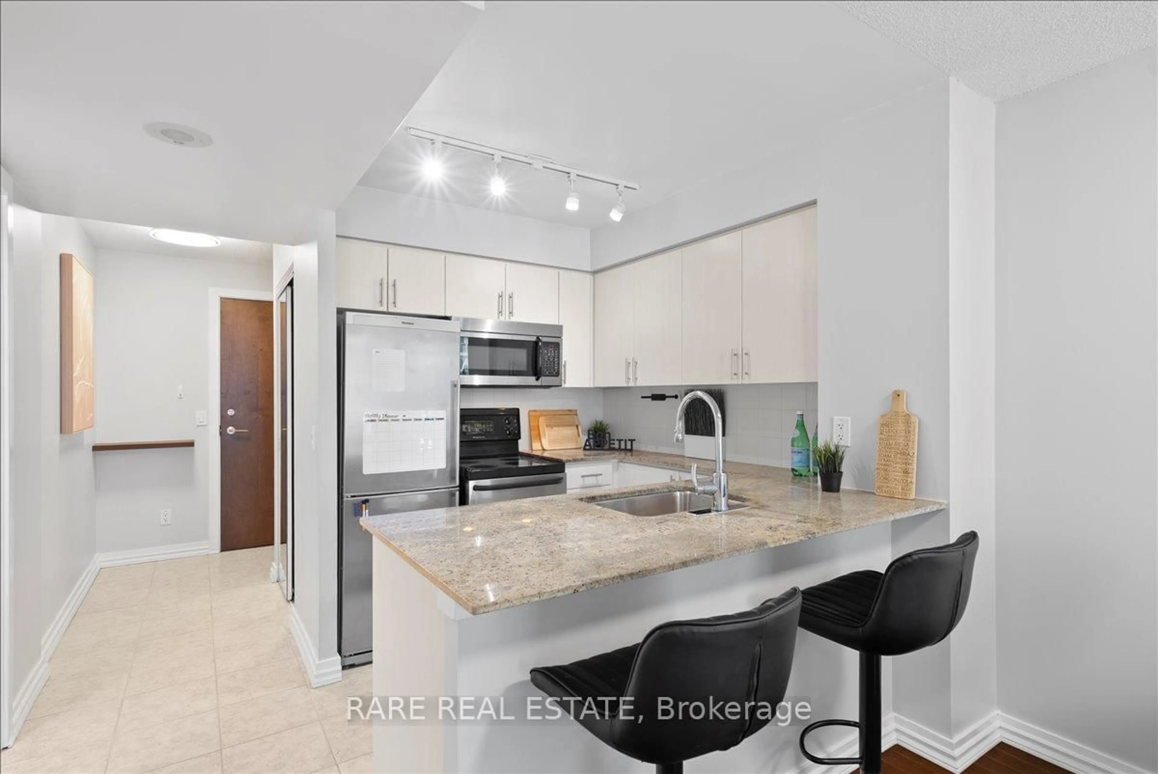 Open concept kitchen, ceramic/tile floor for 50 Lynn Williams St #2211, Toronto Ontario M6K 3R9