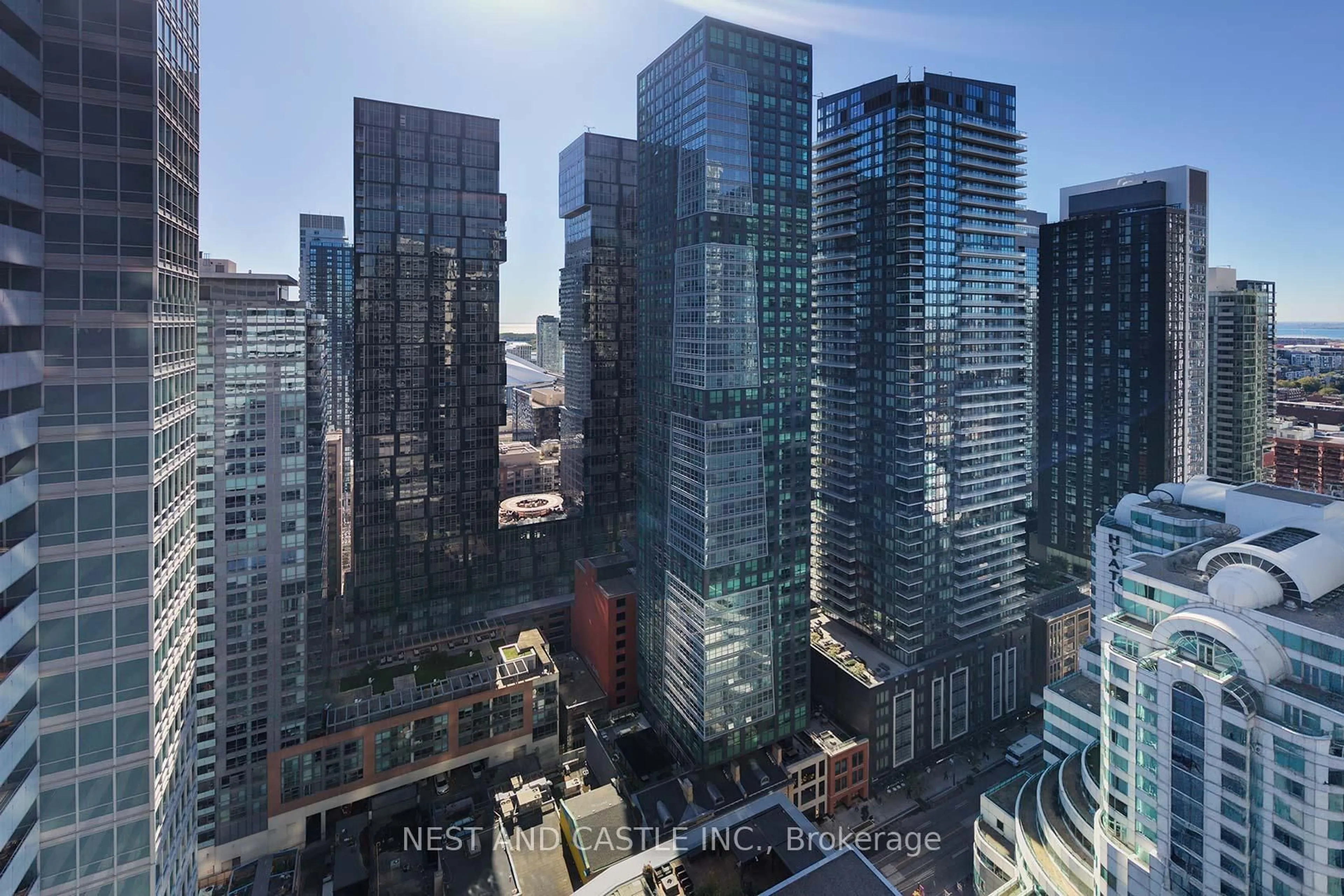 A pic from outside/outdoor area/front of a property/back of a property/a pic from drone, city buildings view from balcony for 327 King St #4104, Toronto Ontario M5V 1J9