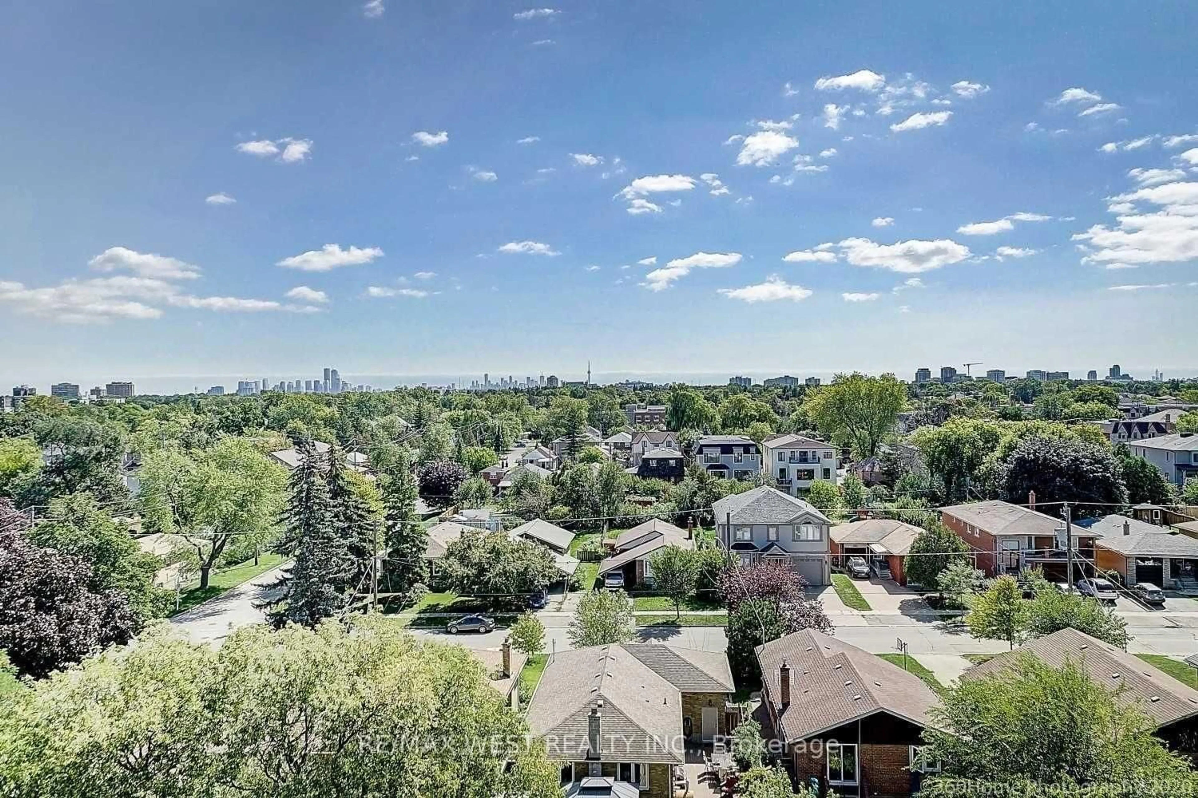 A pic from outside/outdoor area/front of a property/back of a property/a pic from drone, city buildings view from balcony for 741 Sheppard Ave #802, Toronto Ontario M3H 0C9